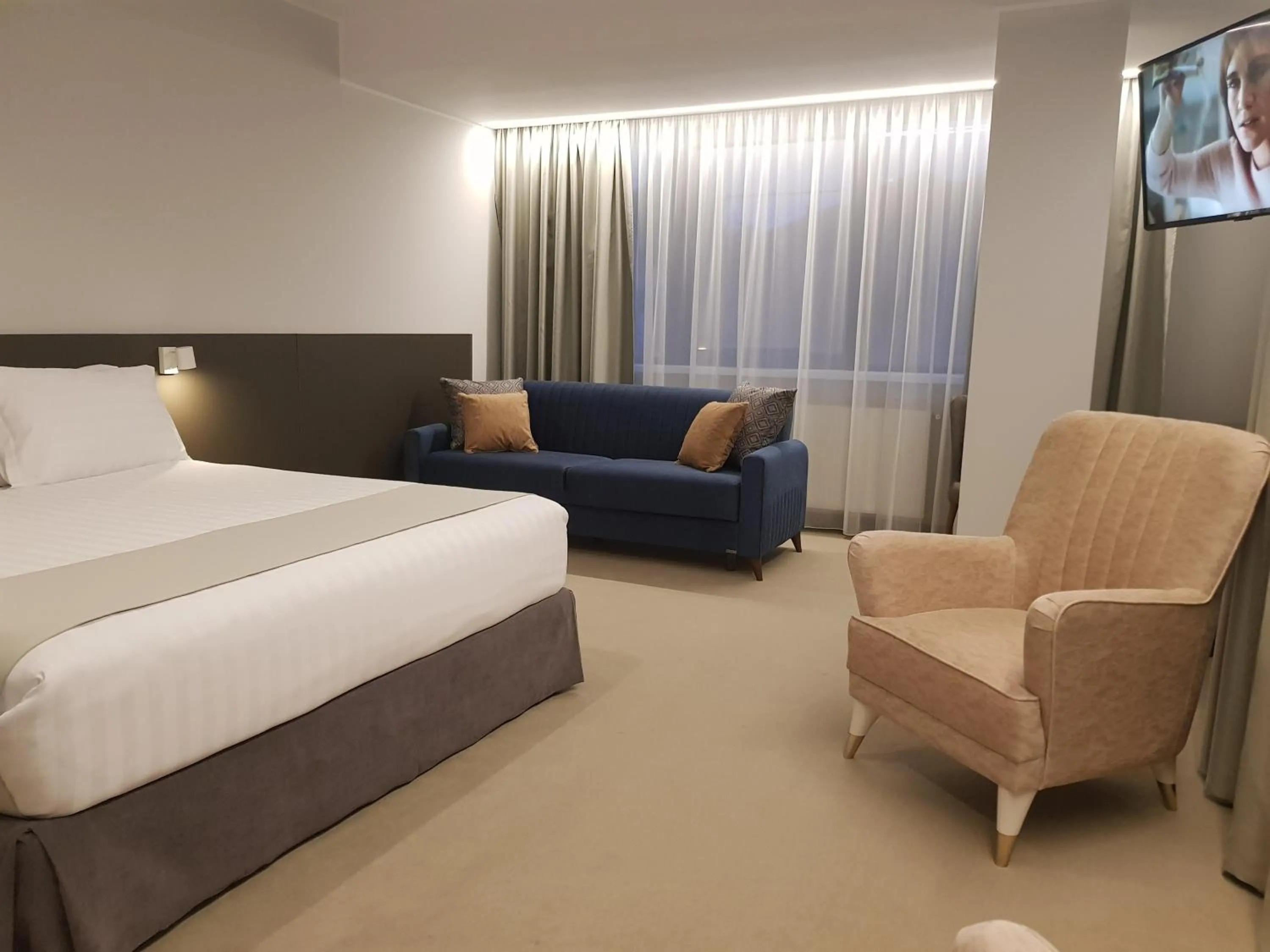 Photo of the whole room, Bed in NOVO Boutique