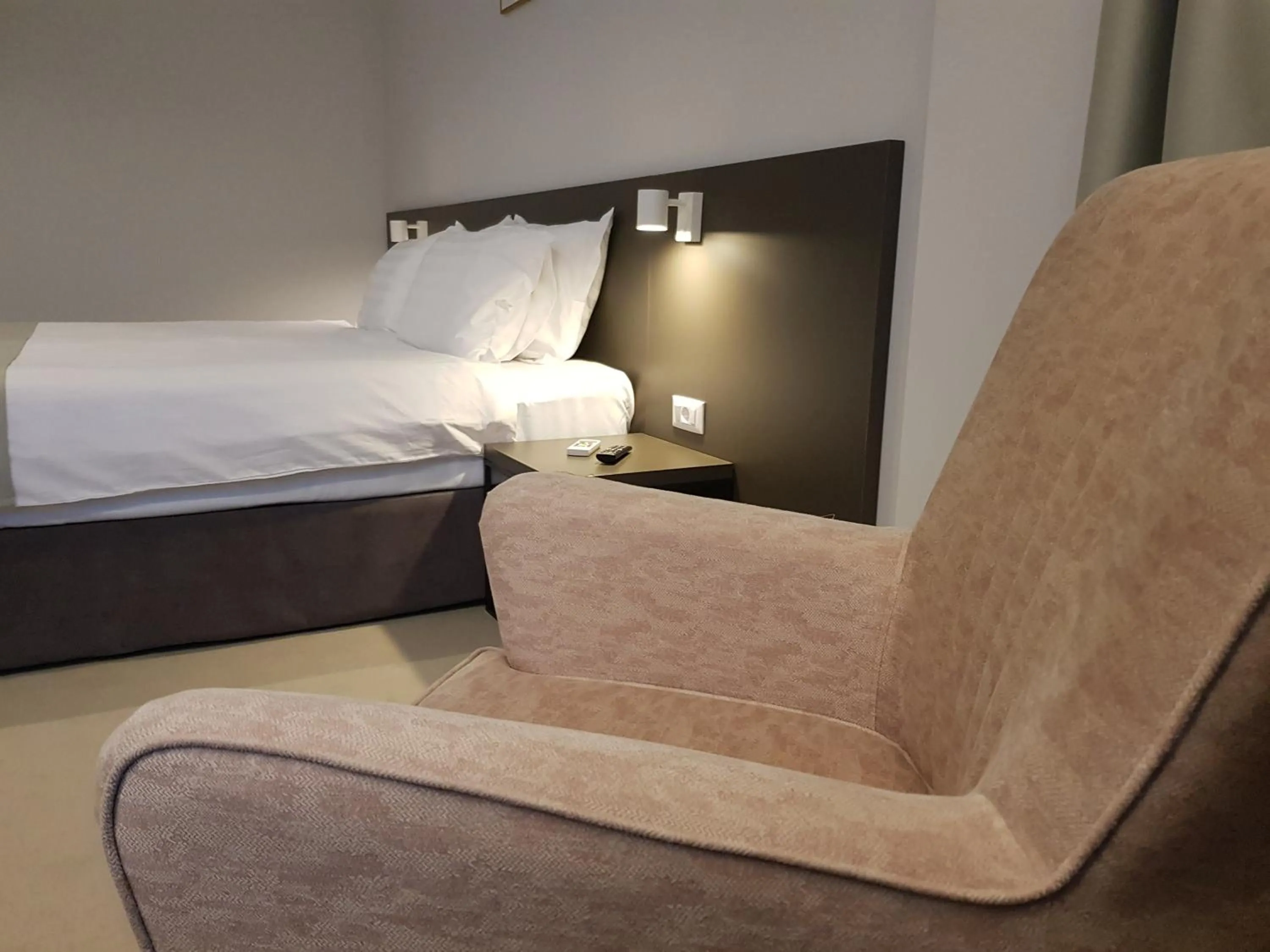 Photo of the whole room, Bed in NOVO Boutique