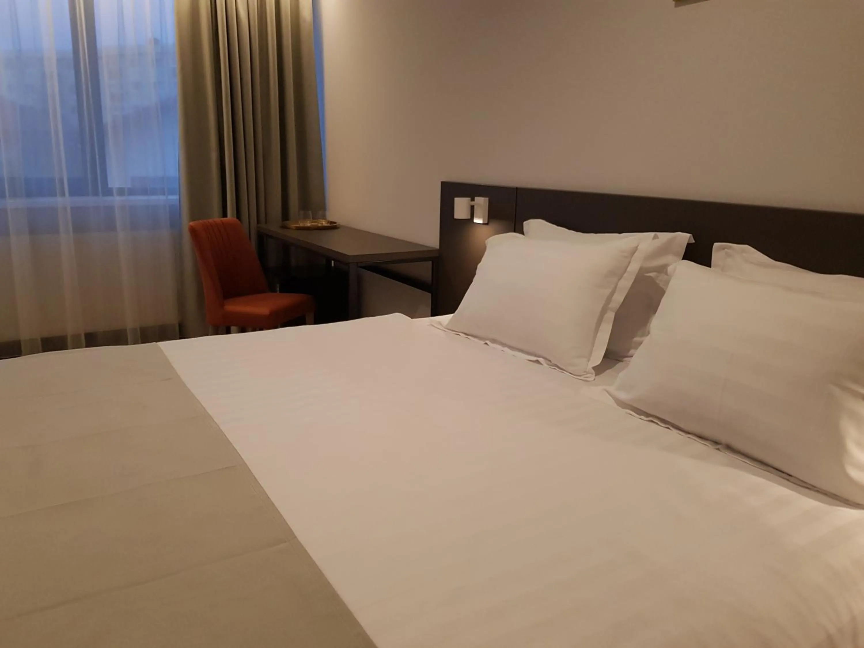 Photo of the whole room, Bed in NOVO Boutique