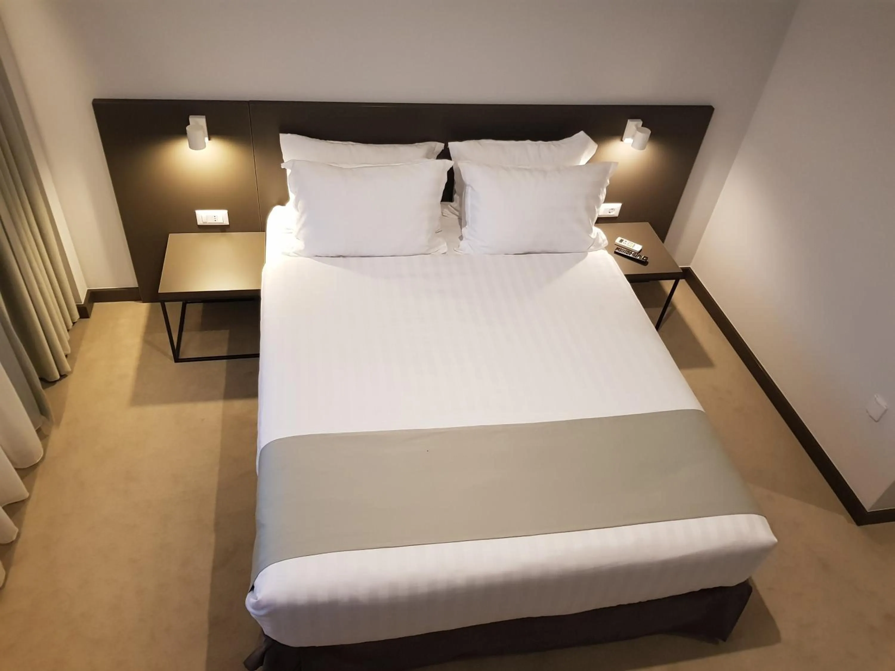 Photo of the whole room, Bed in NOVO Boutique