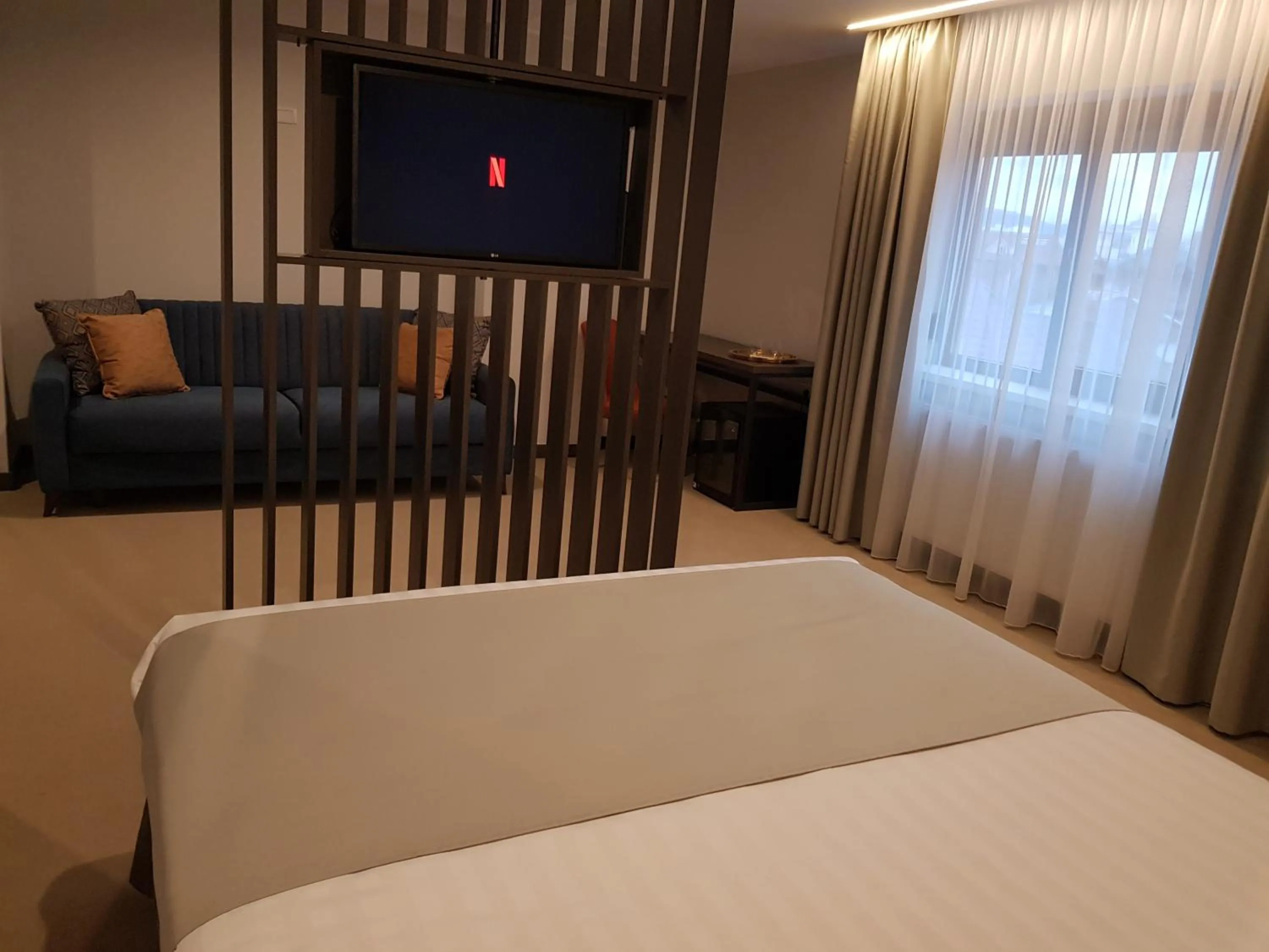 Photo of the whole room, Bed in NOVO Boutique