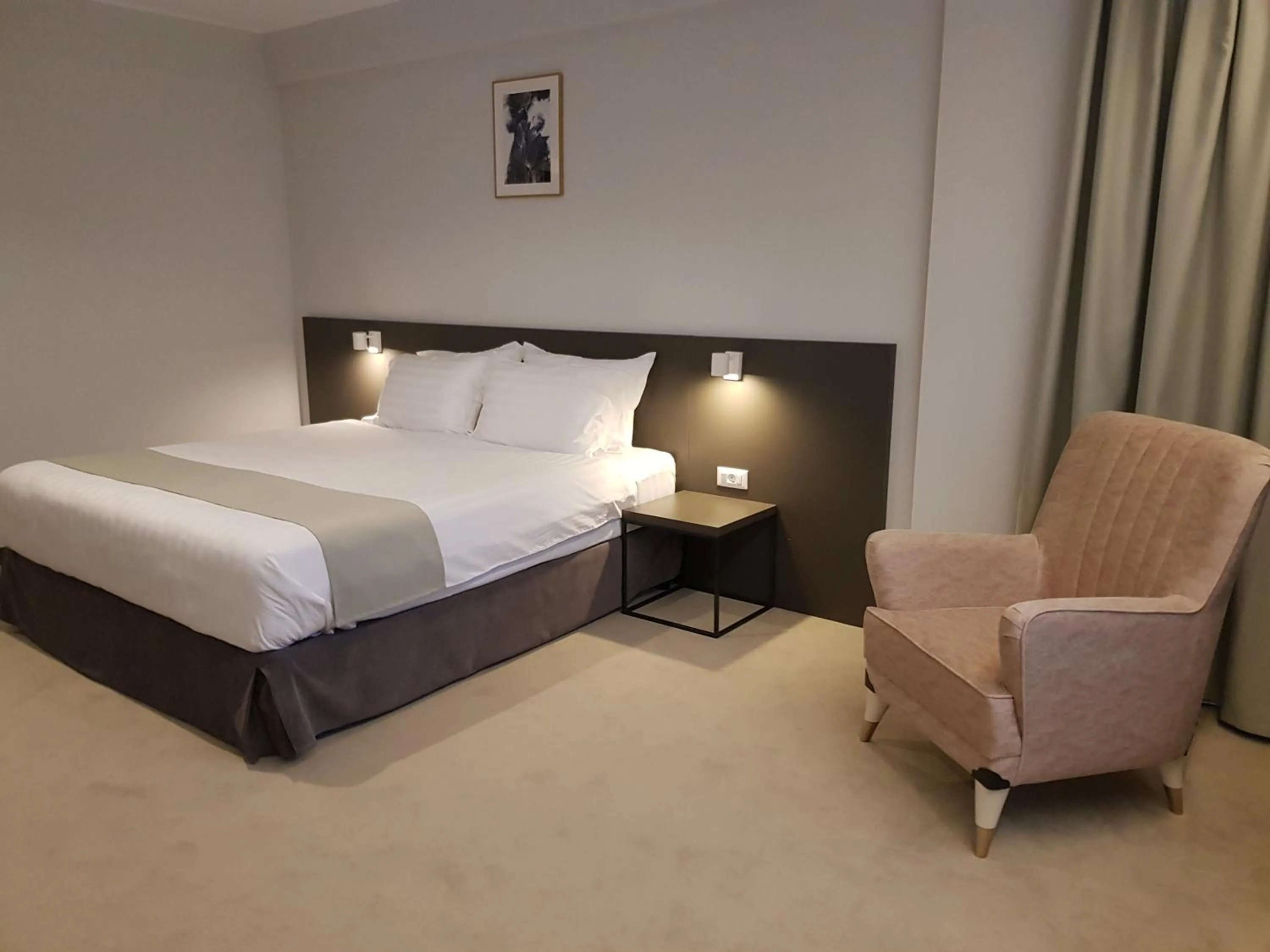 Photo of the whole room, Bed in NOVO Boutique