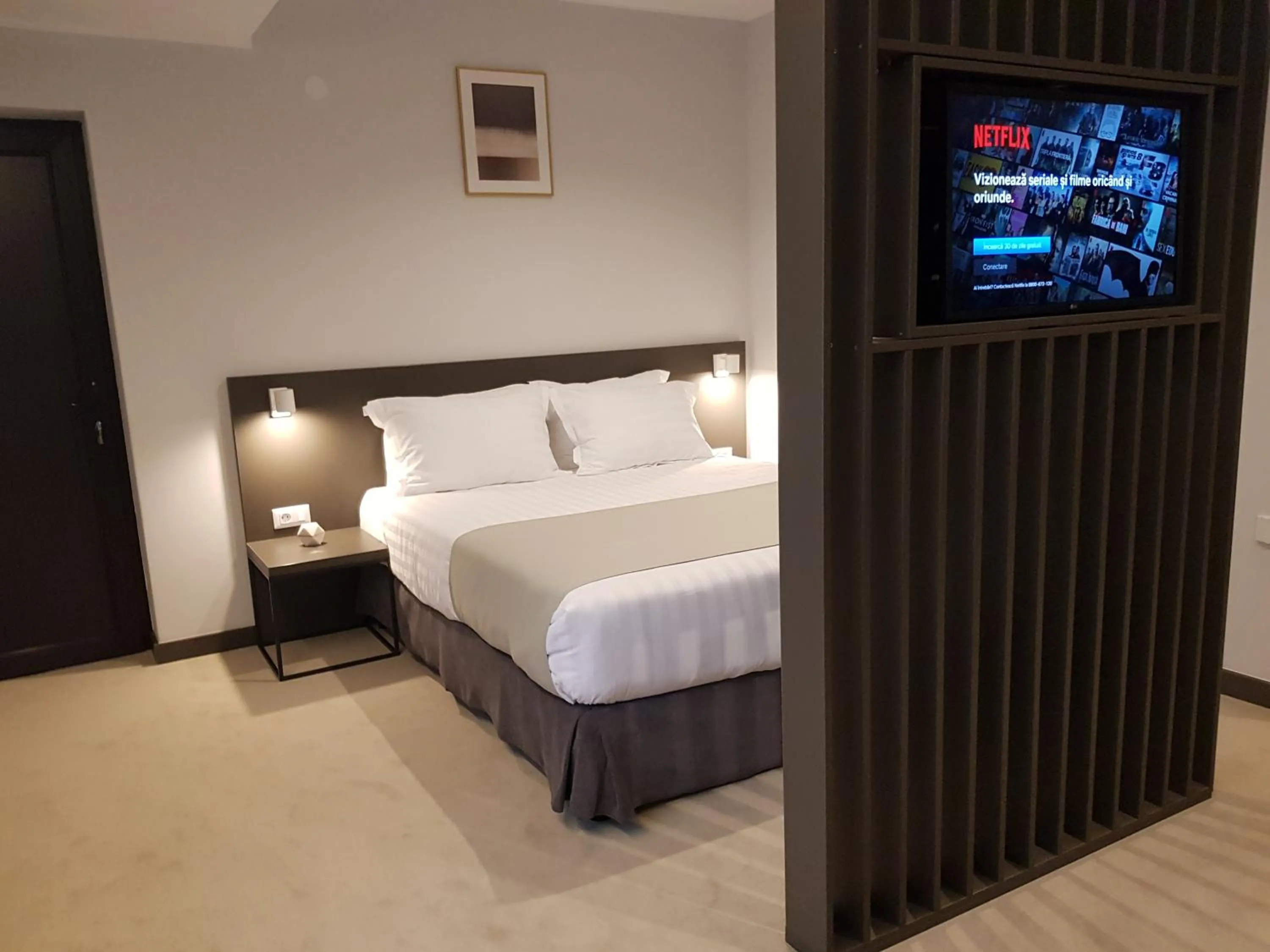 Photo of the whole room, Bed in NOVO Boutique