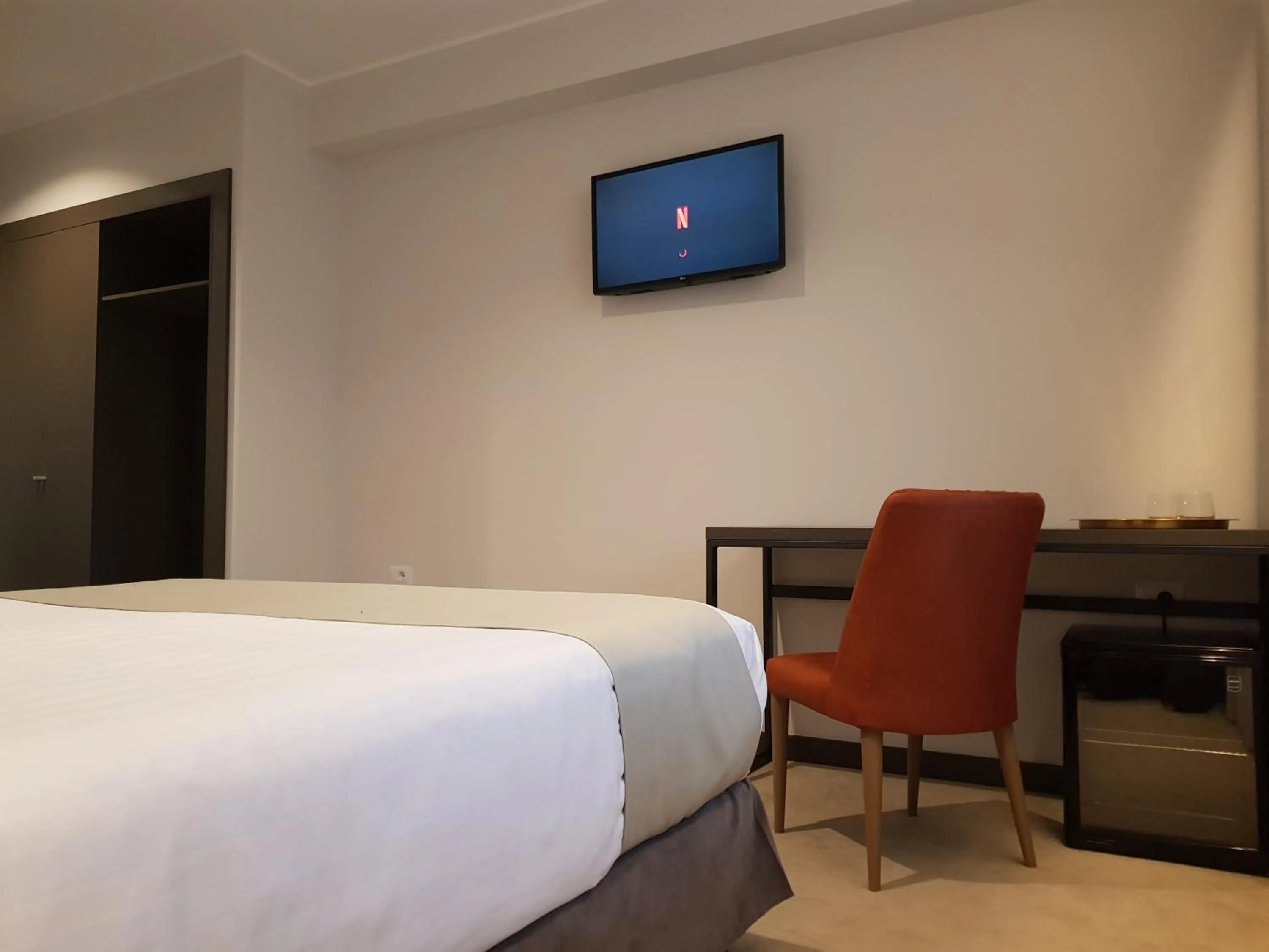 Photo of the whole room, Bed in NOVO Boutique