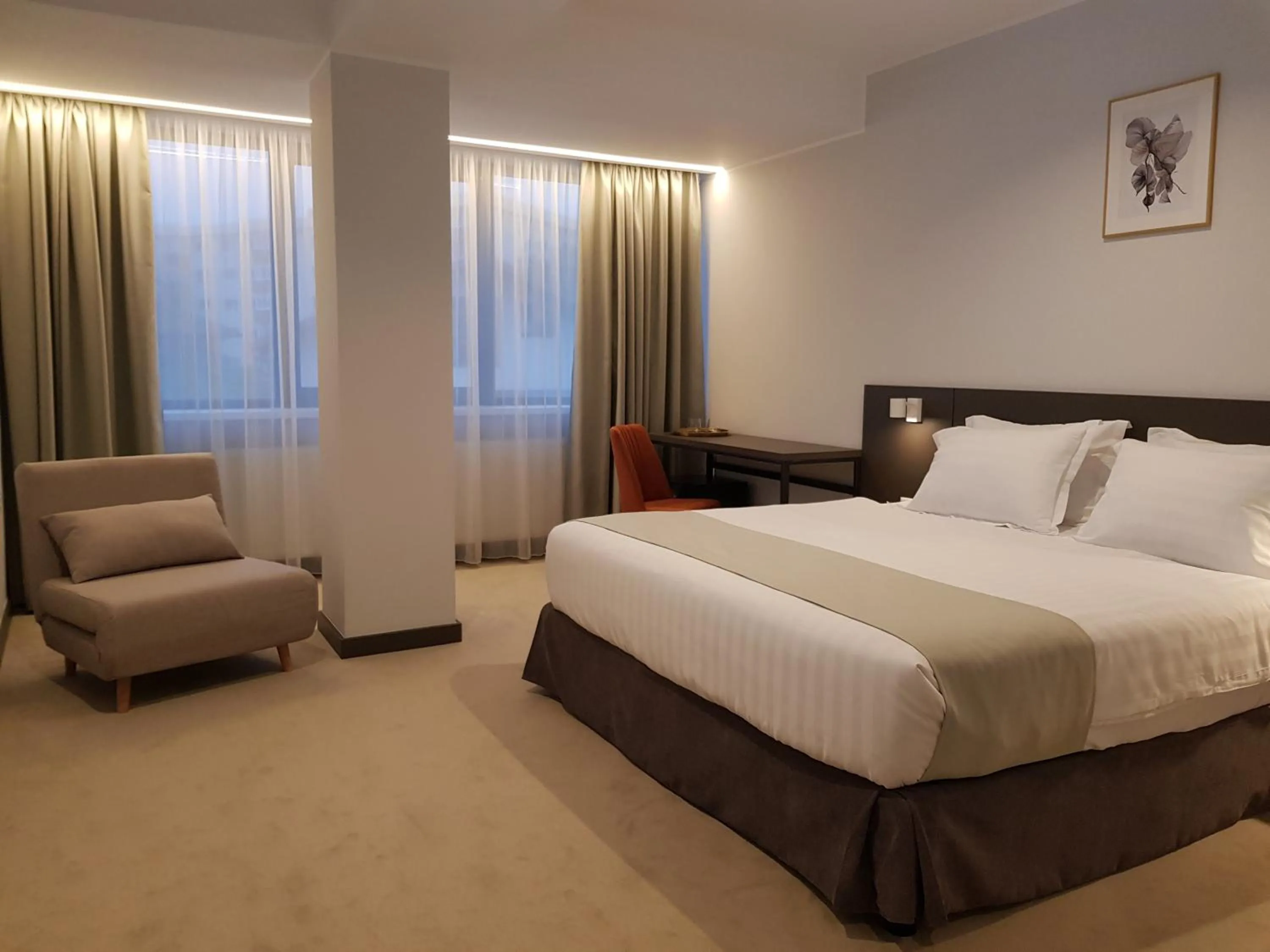 Photo of the whole room, Bed in NOVO Boutique