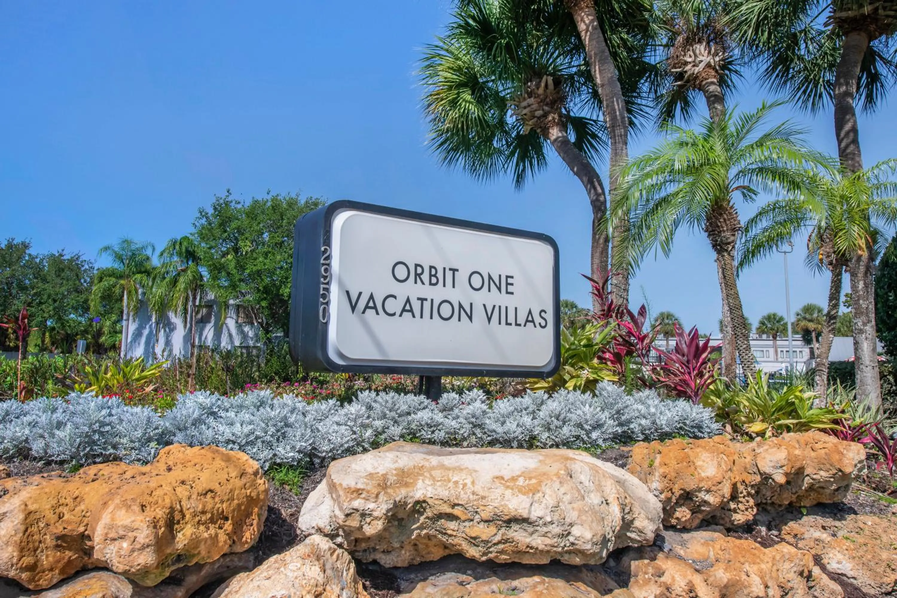 Property logo or sign in Orbit One Vacation Villas