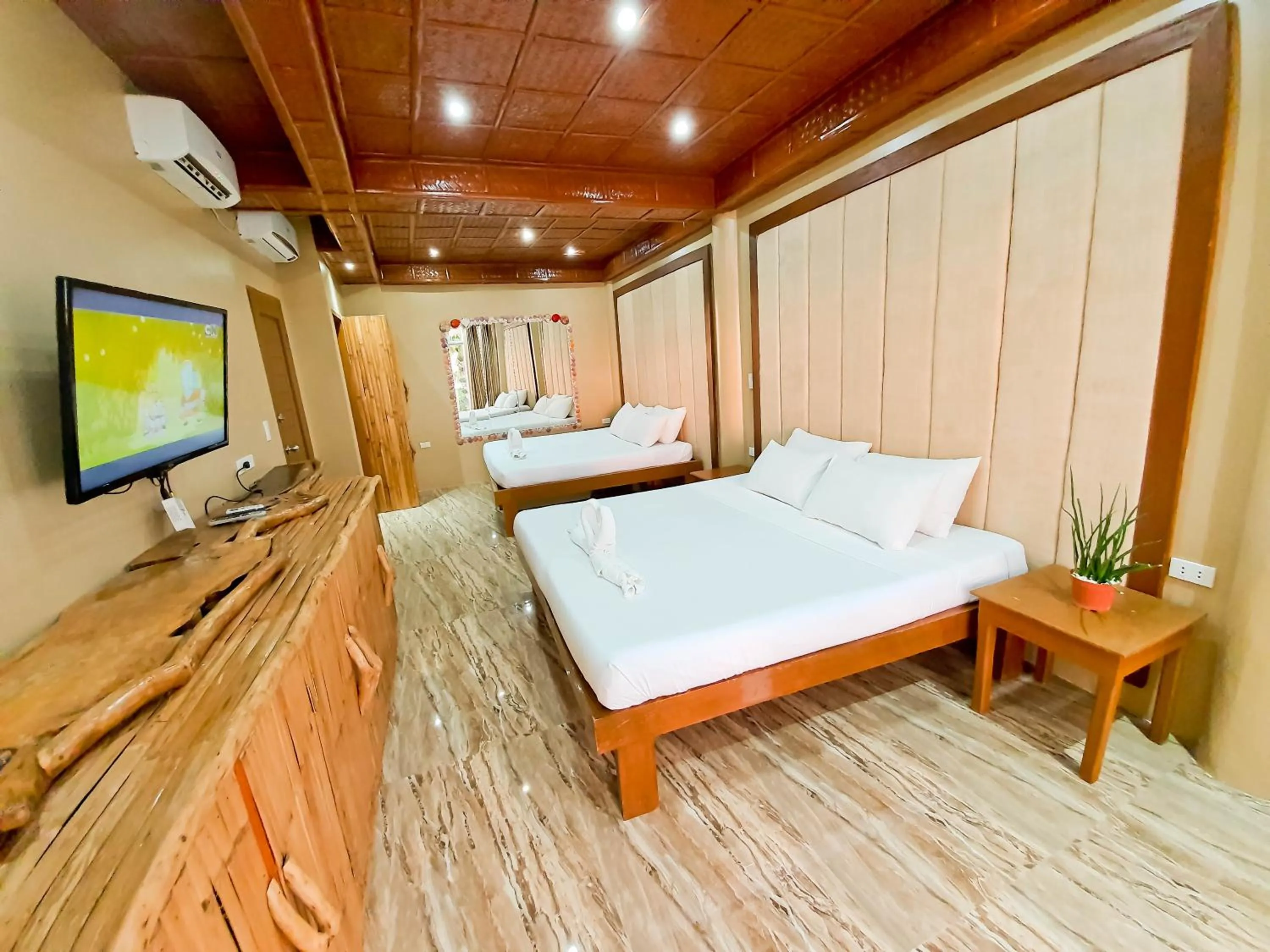 Bed in Kaiyana Boracay Beach Resort