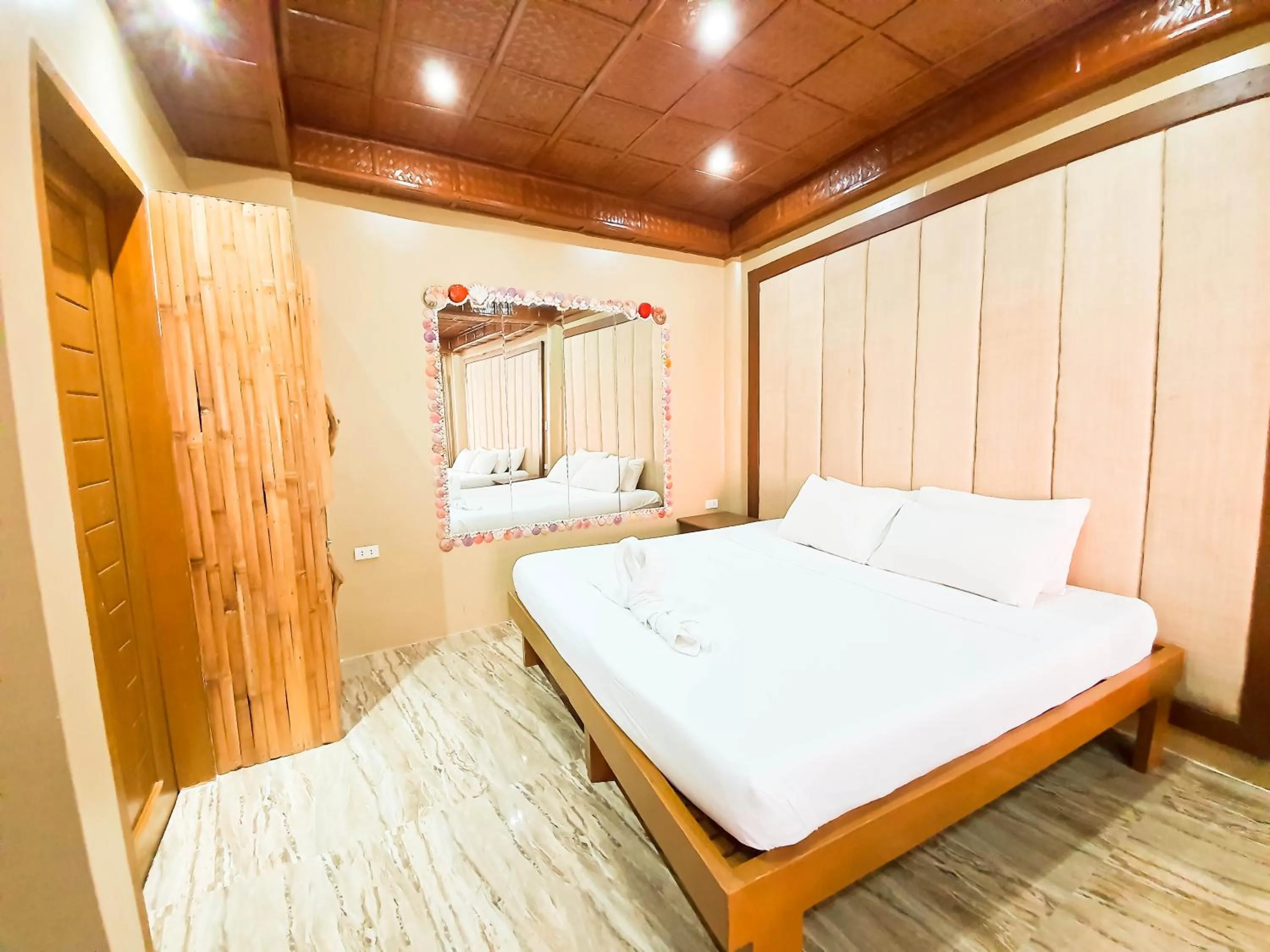 Bed in Kaiyana Boracay Beach Resort