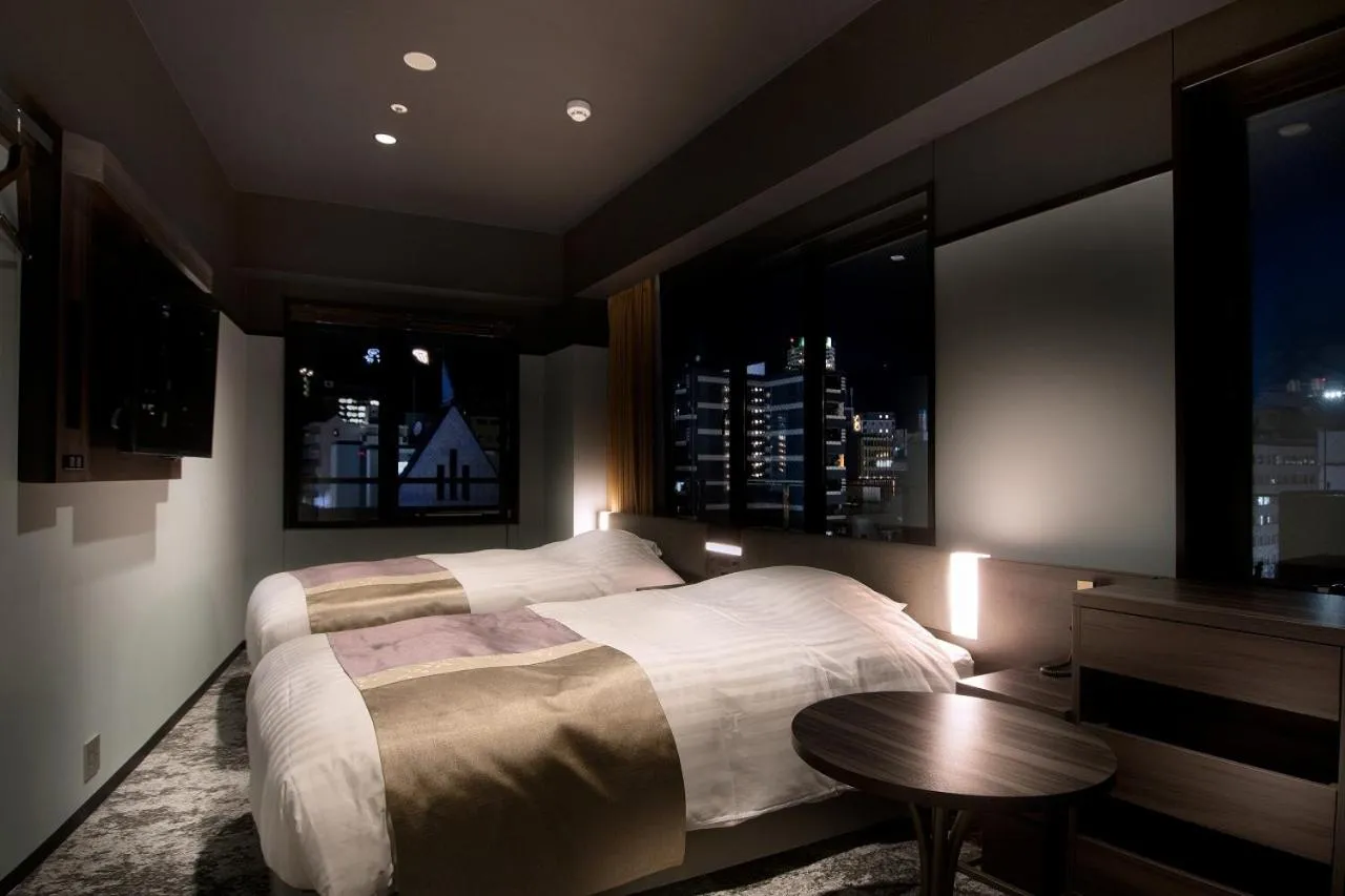 Bed in Kobe Plaza Hotel West