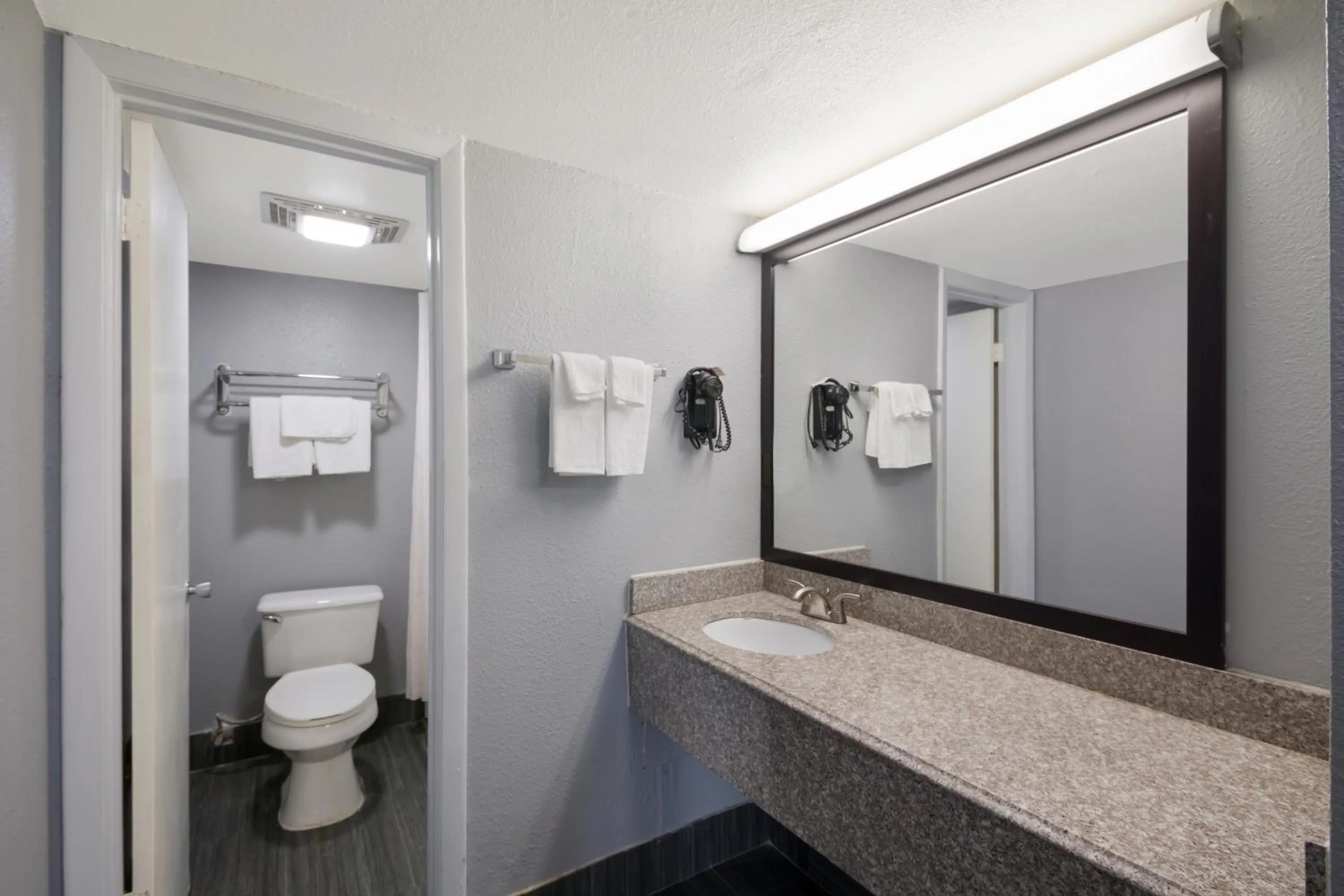 Toilet in Econo Lodge Austin North near The Domain