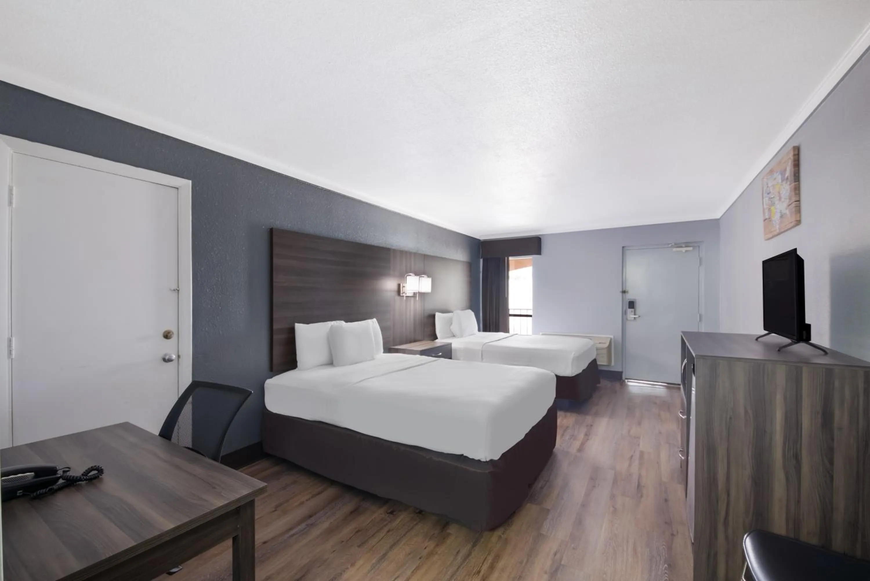 Photo of the whole room, Bed in Econo Lodge Austin North near The Domain