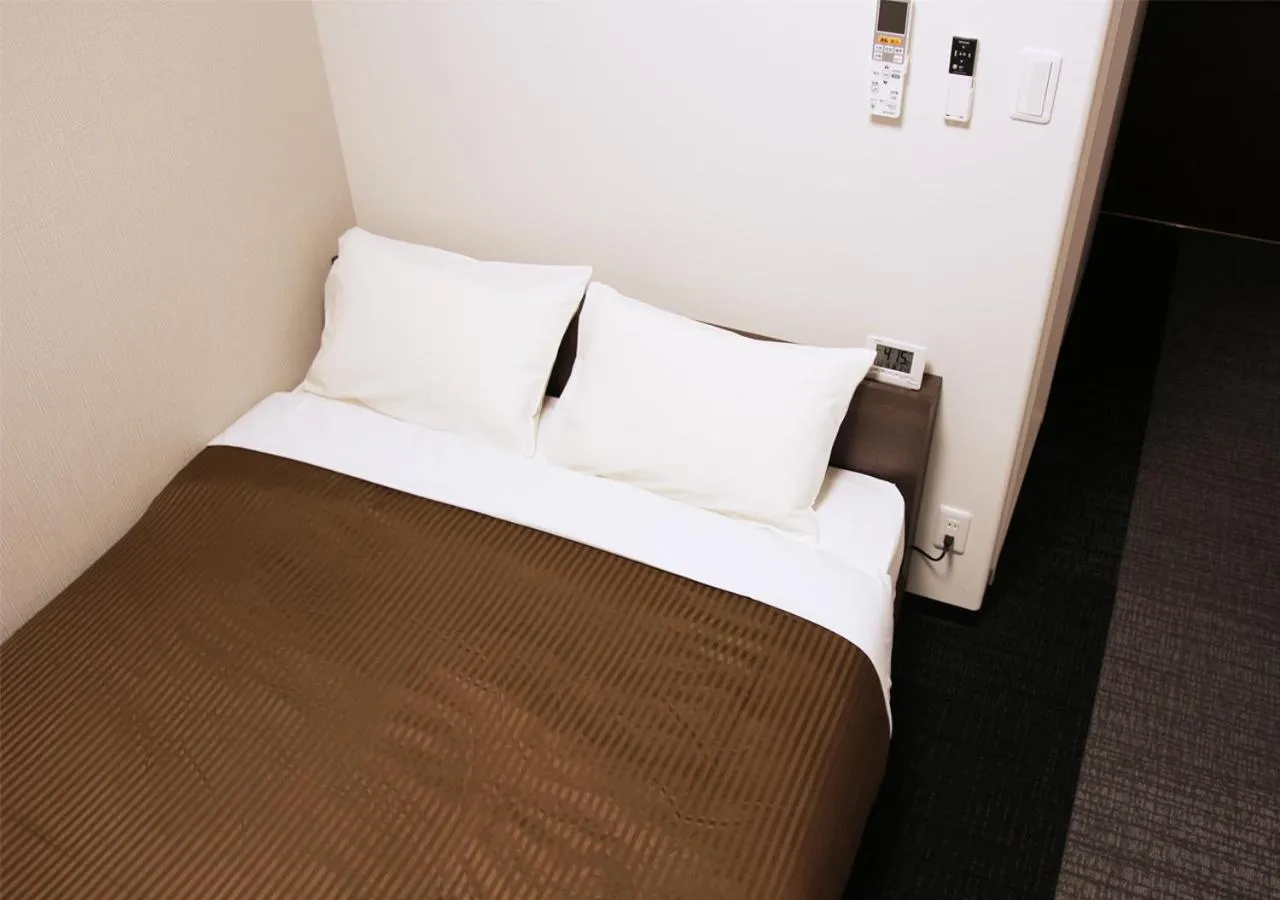 Photo of the whole room, Bed in Hotel Trend Numazu Ekimae