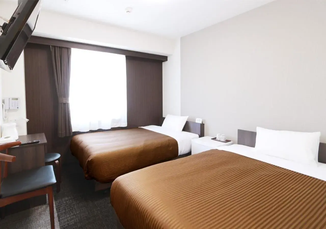 Photo of the whole room, Bed in Hotel Trend Numazu Ekimae Photo of the whole room, Bed in Hotel Trend Numazu Ekimae