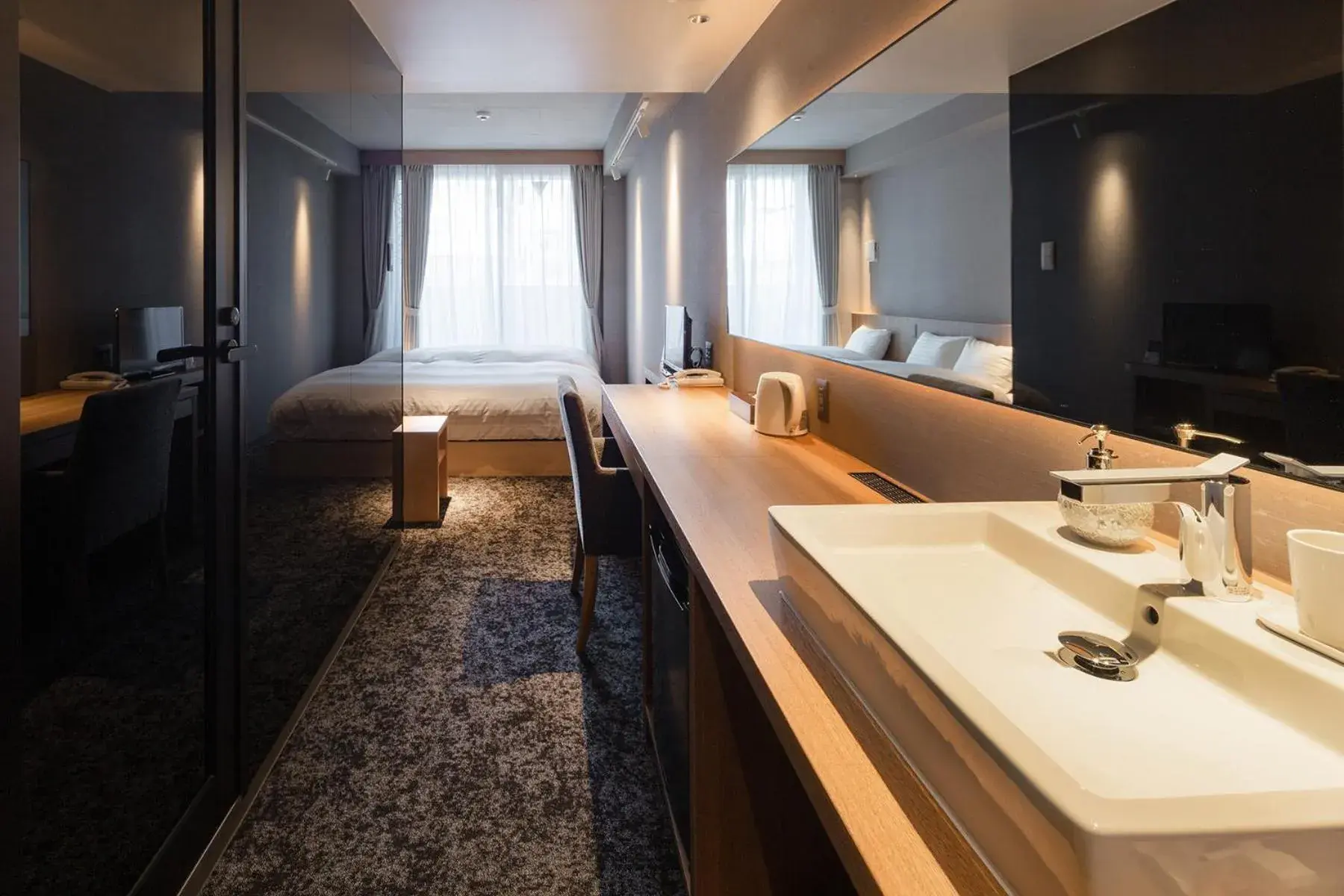 Twin Room - single occupancy in MATERIAL Fuchomae Twin Room - single occupancy in MATERIAL Fuchomae