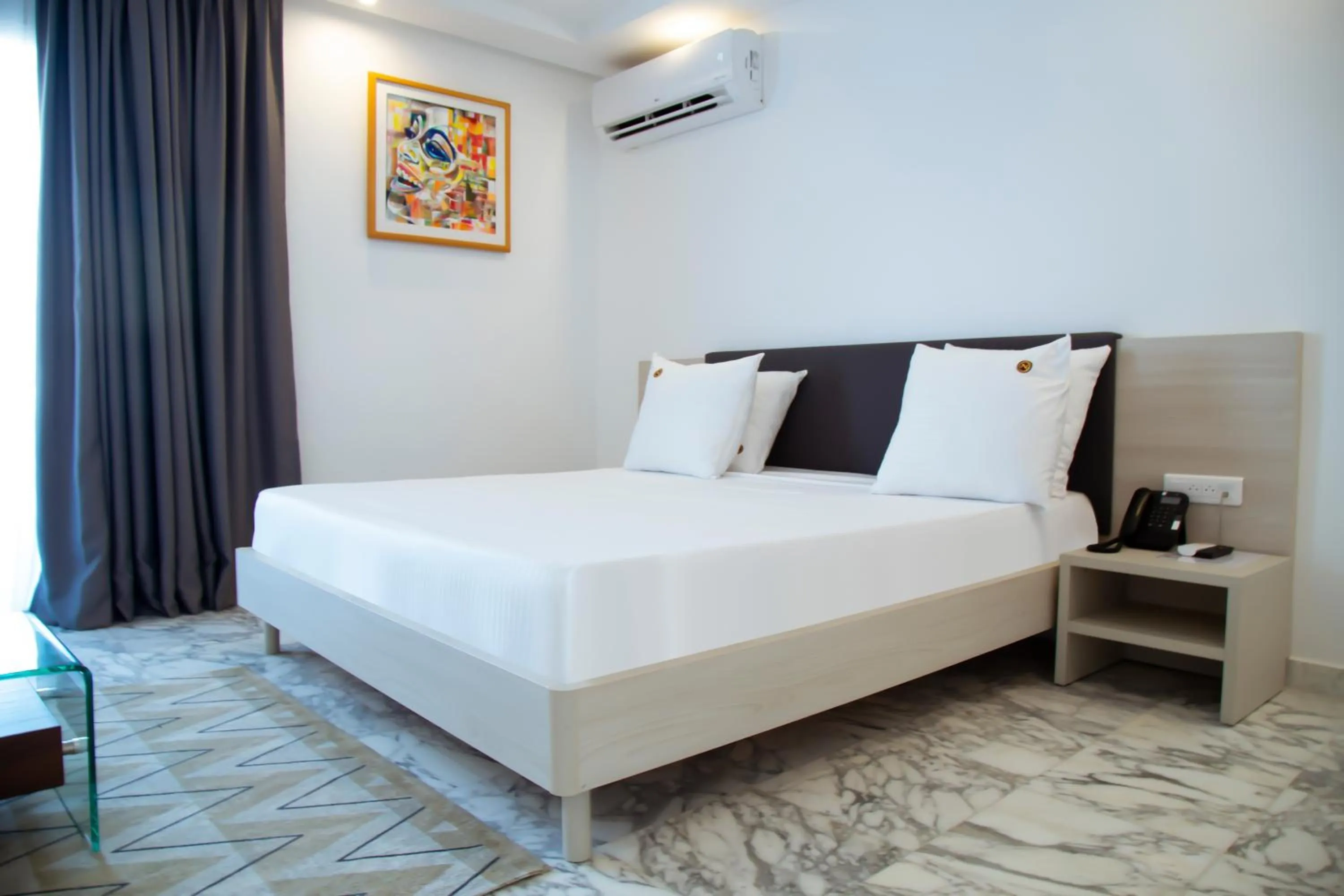 Bed in Le Ndiambour Hôtel et Résidence