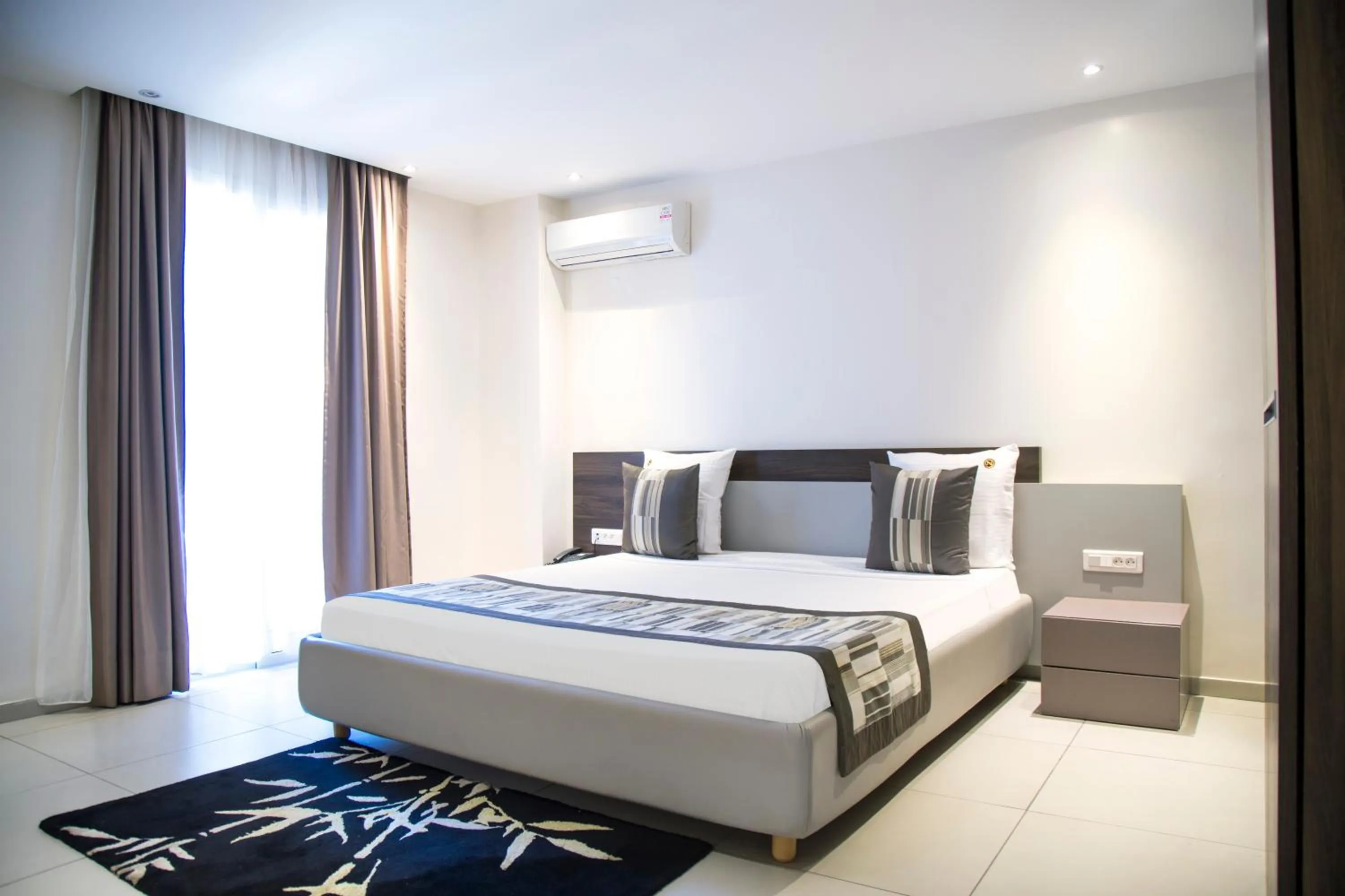 Bedroom, Bed in Le Ndiambour Hôtel et Résidence