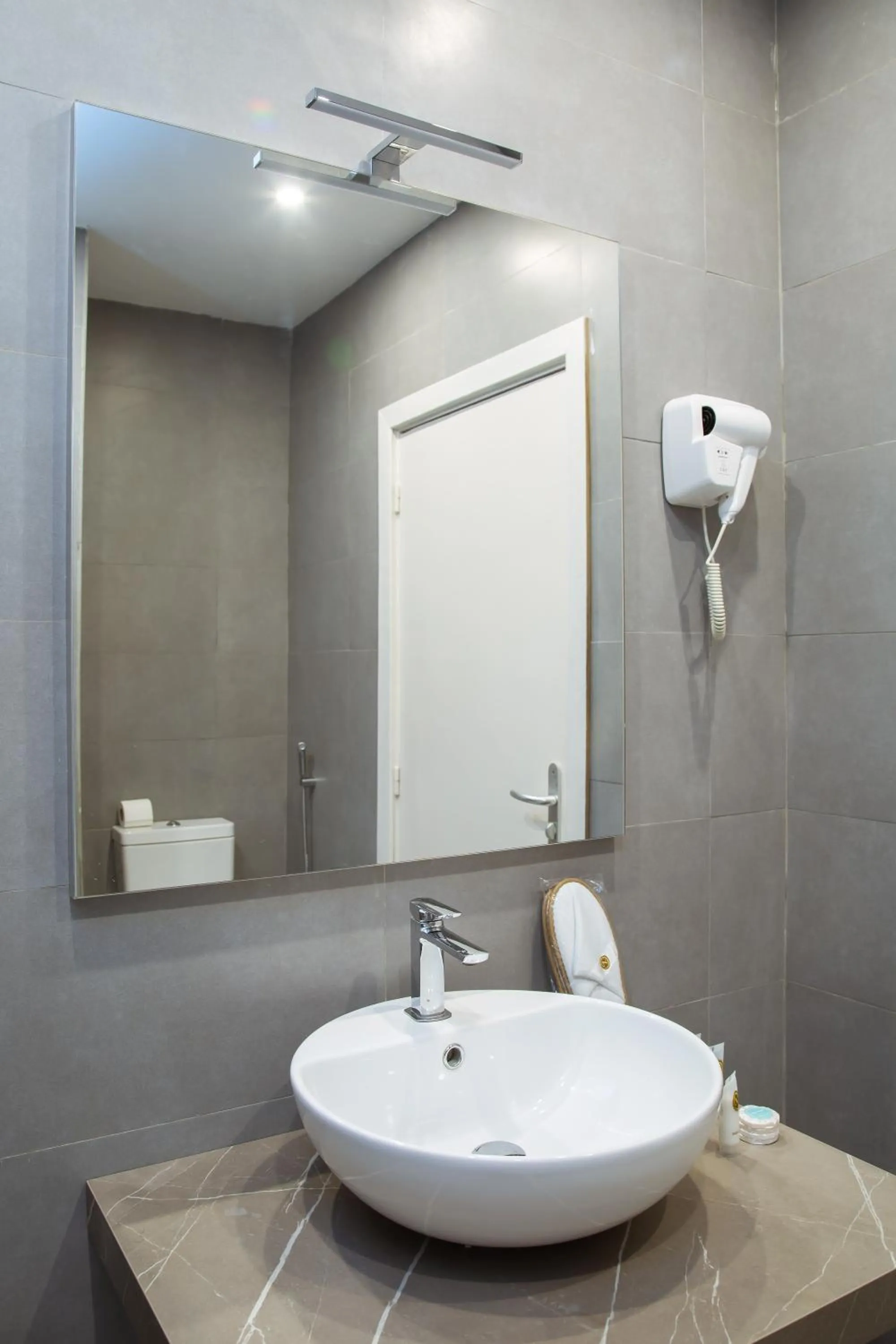 Bathroom in Le Ndiambour Hôtel et Résidence