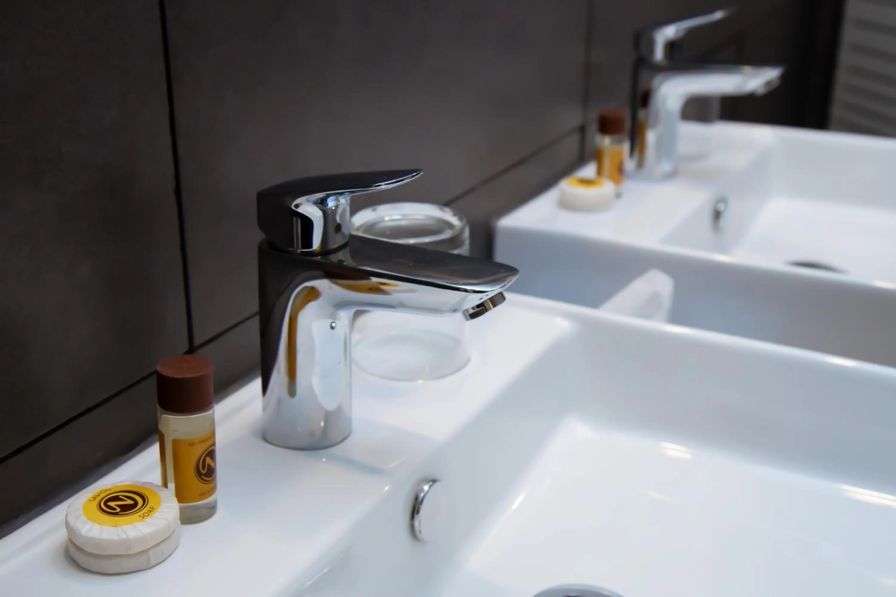 Bathroom in Le Ndiambour Hôtel et Résidence