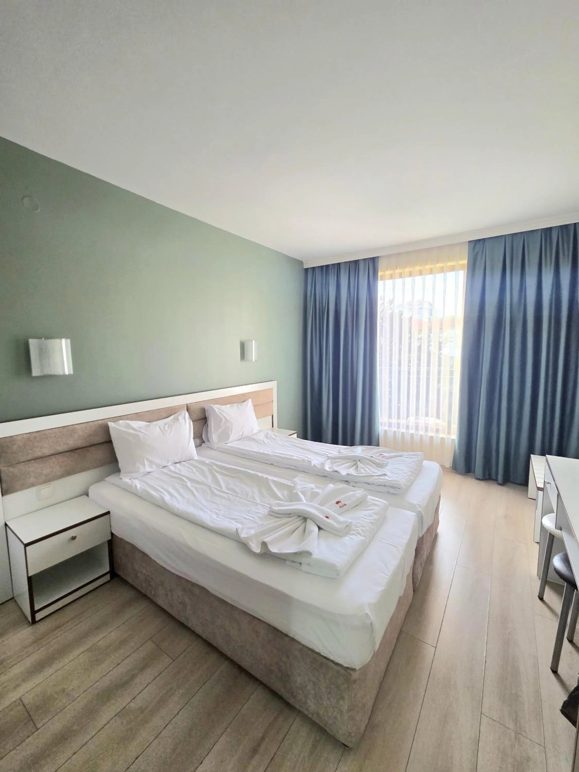 Bed in Elegance Spa Hotel