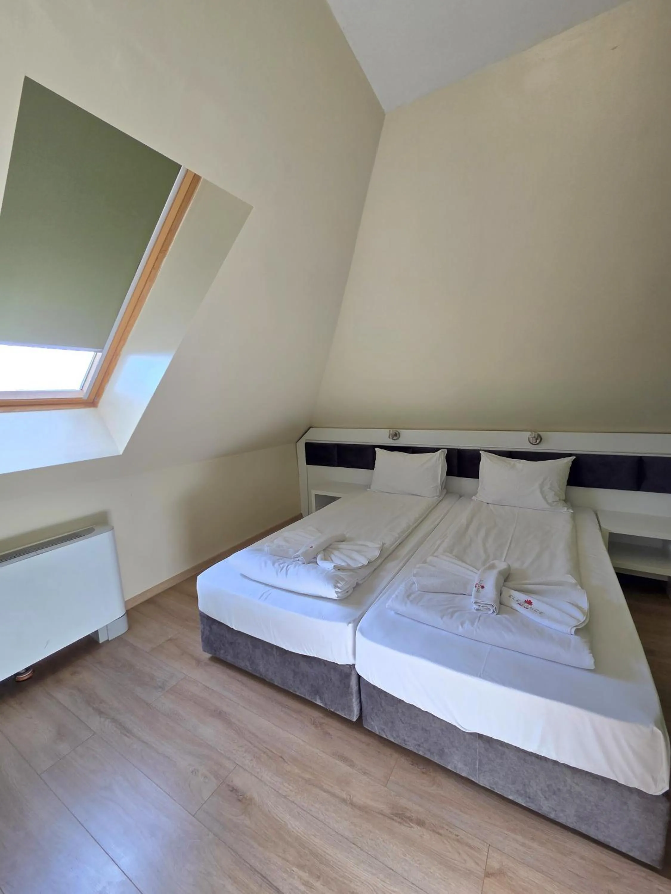 Bed in Elegance Spa Hotel