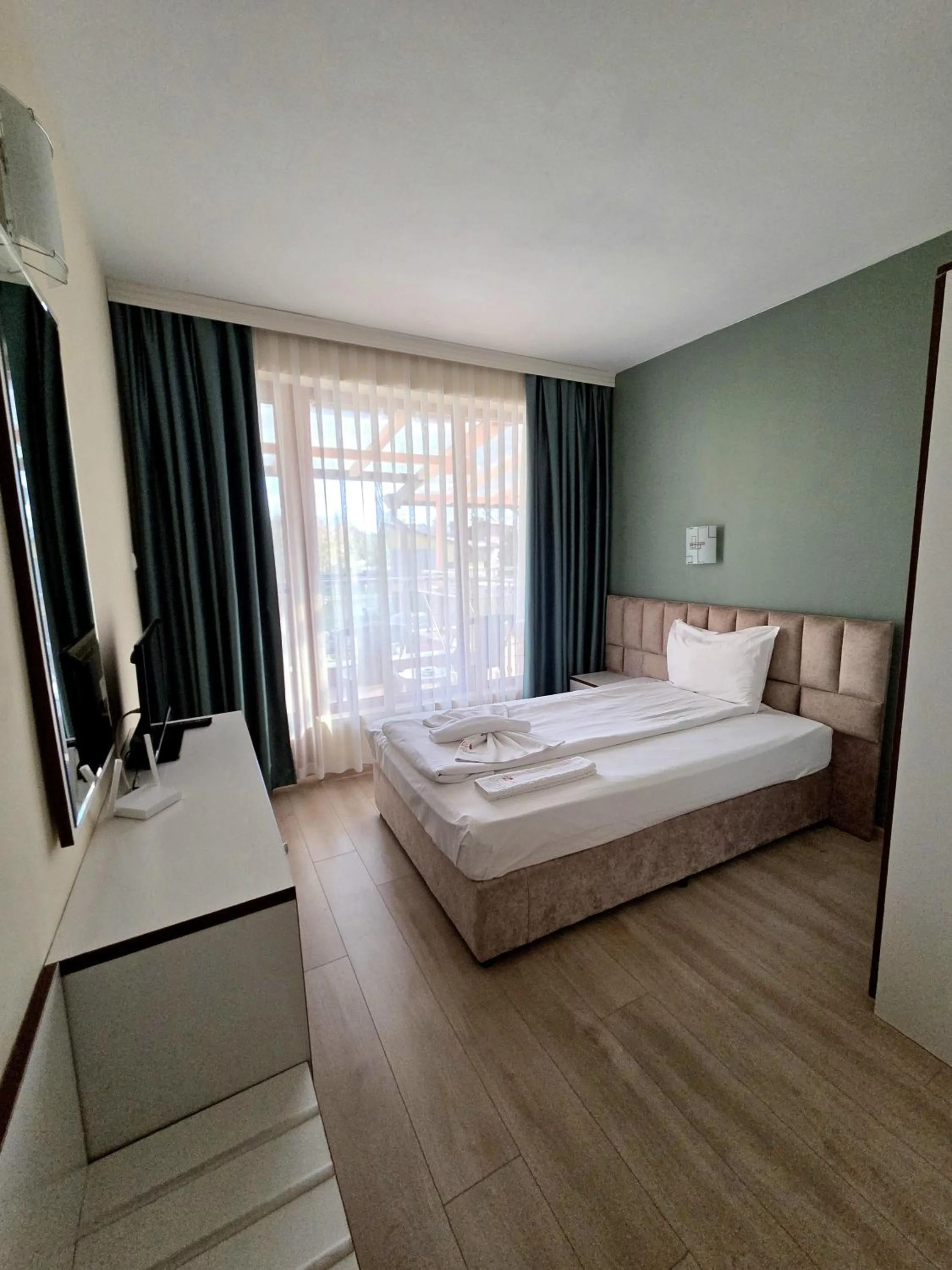 Bed in Elegance Spa Hotel