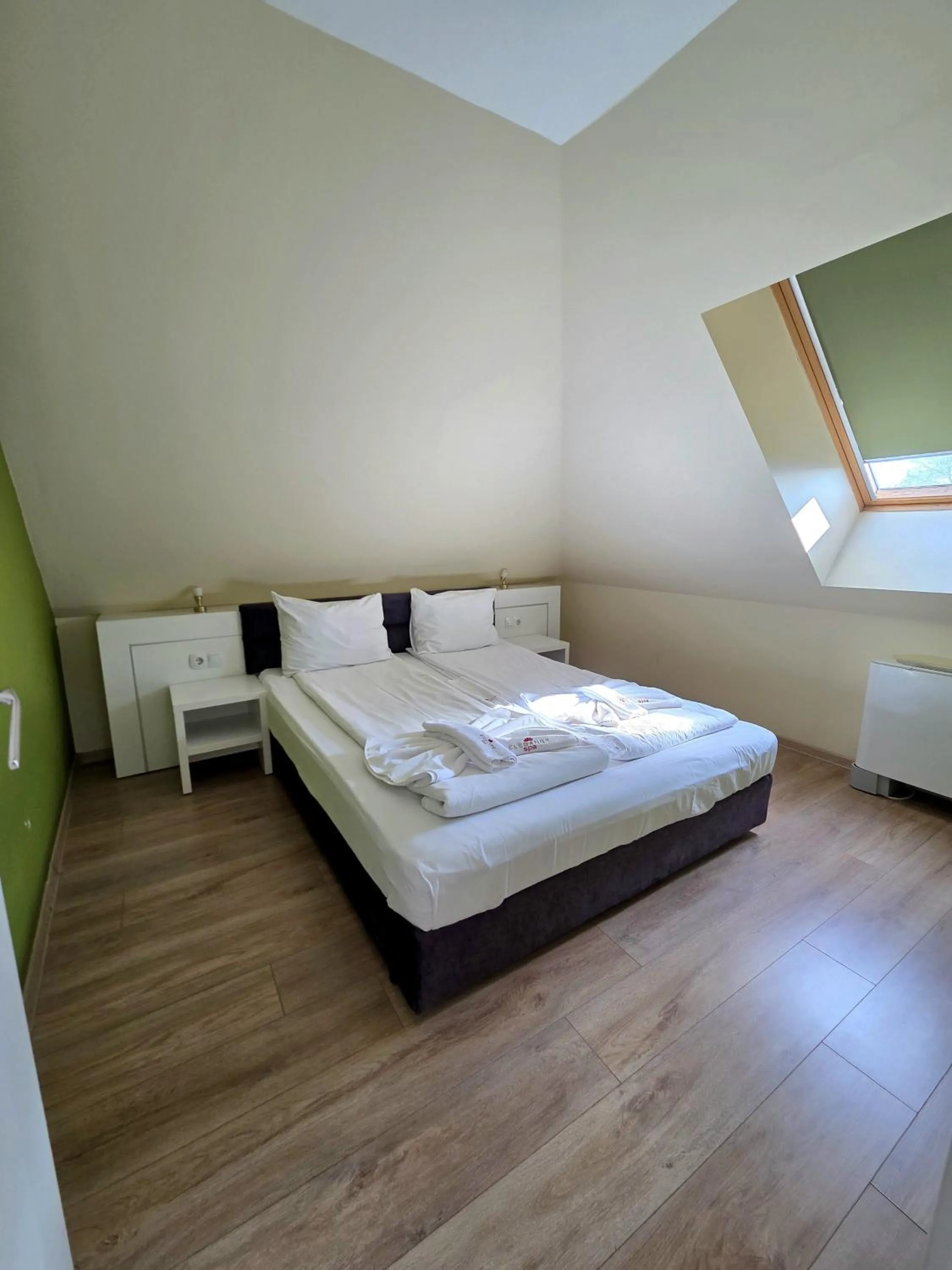 Bed in Elegance Spa Hotel