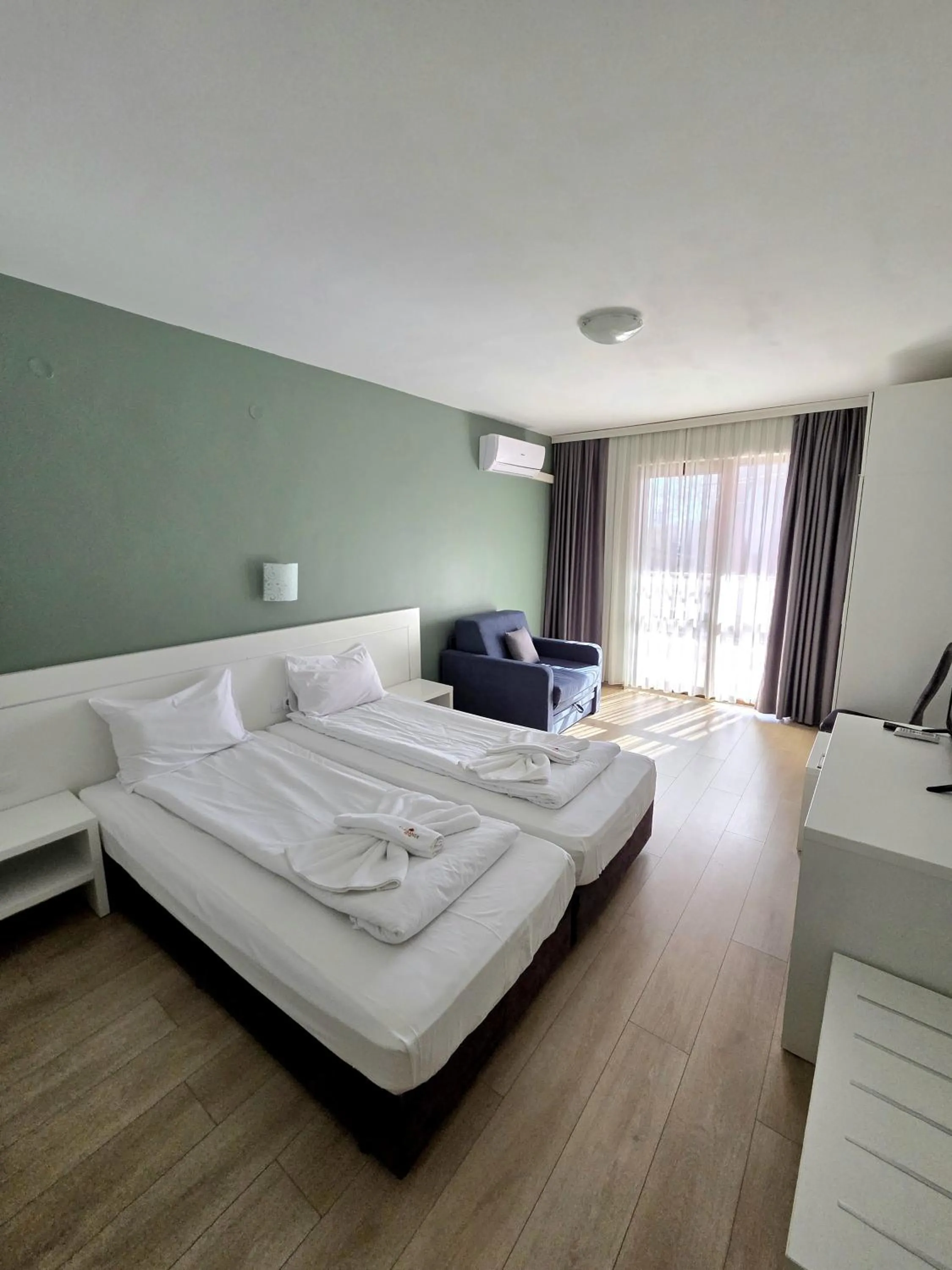 Bed in Elegance Spa Hotel