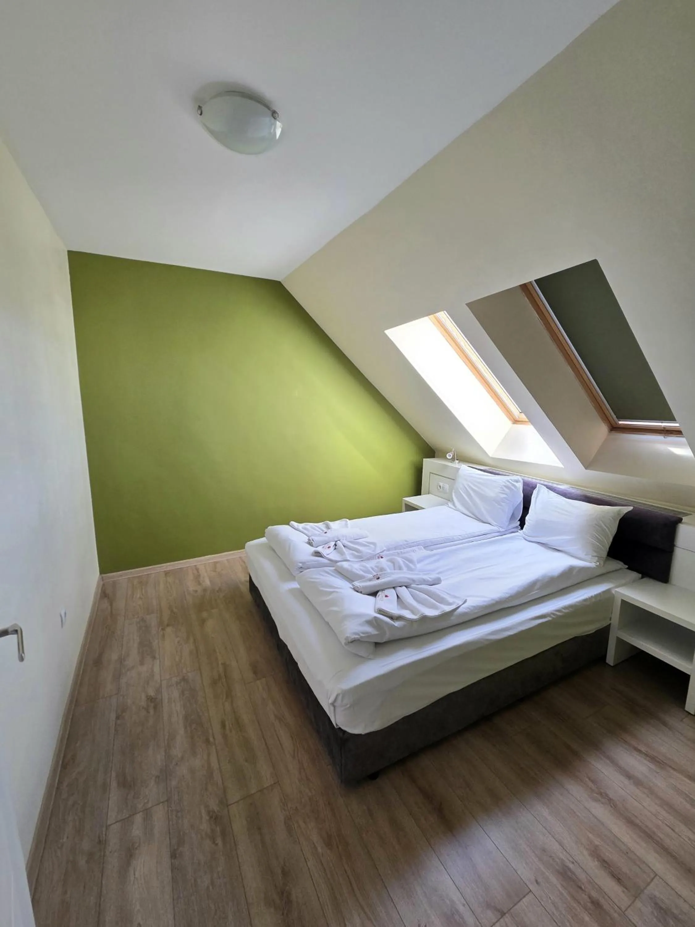 Bed in Elegance Spa Hotel