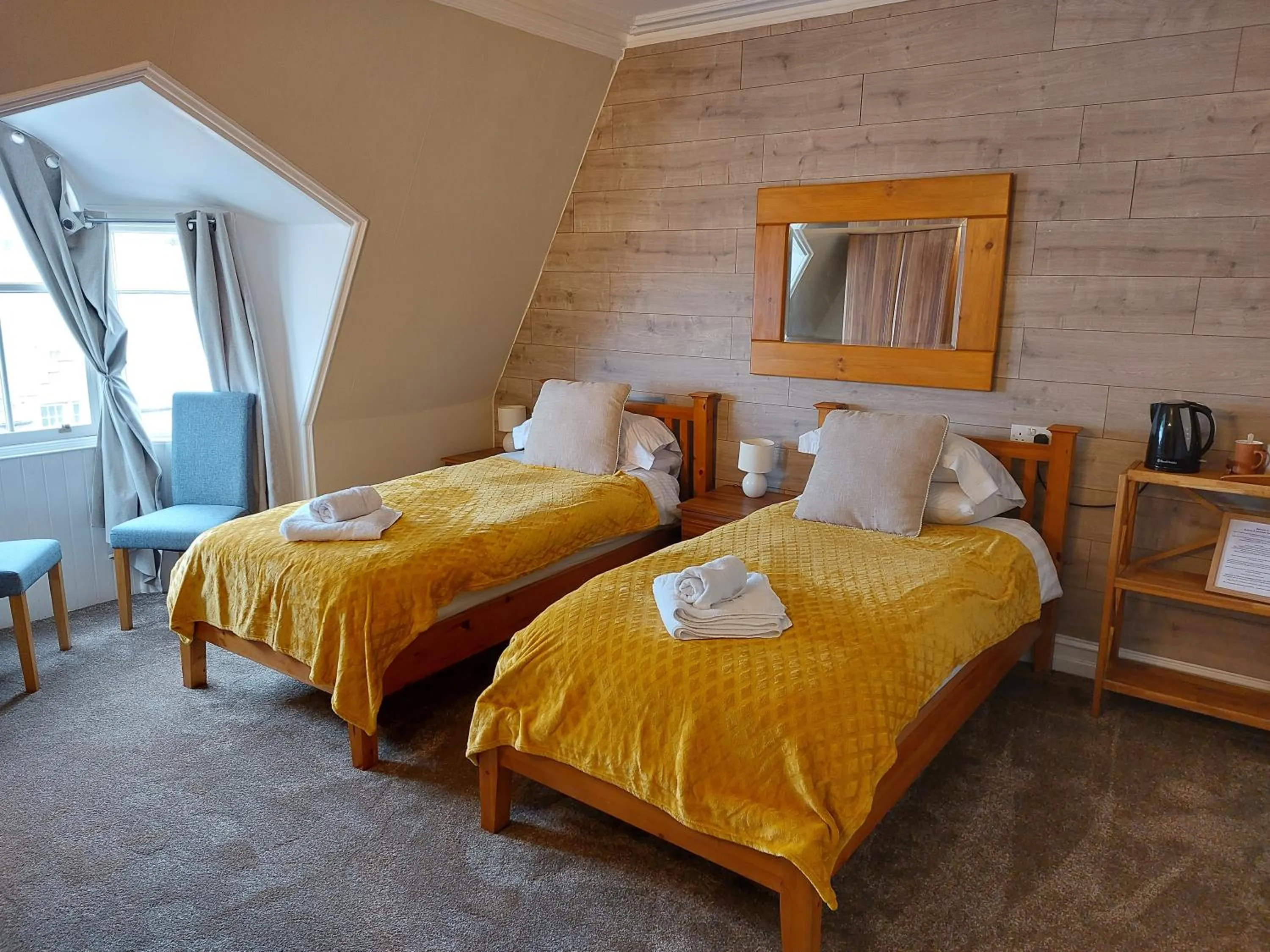 Bed in Solheim Guest House