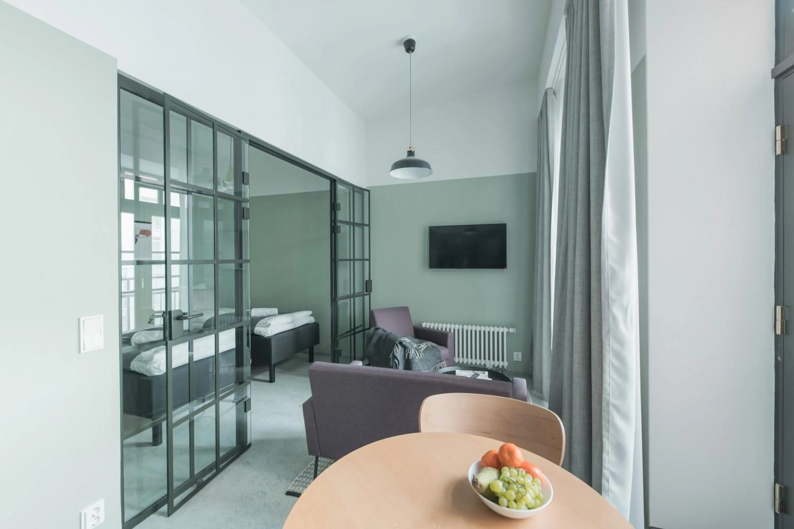 Living room, Bed in Forenom Aparthotel Jyväskylä