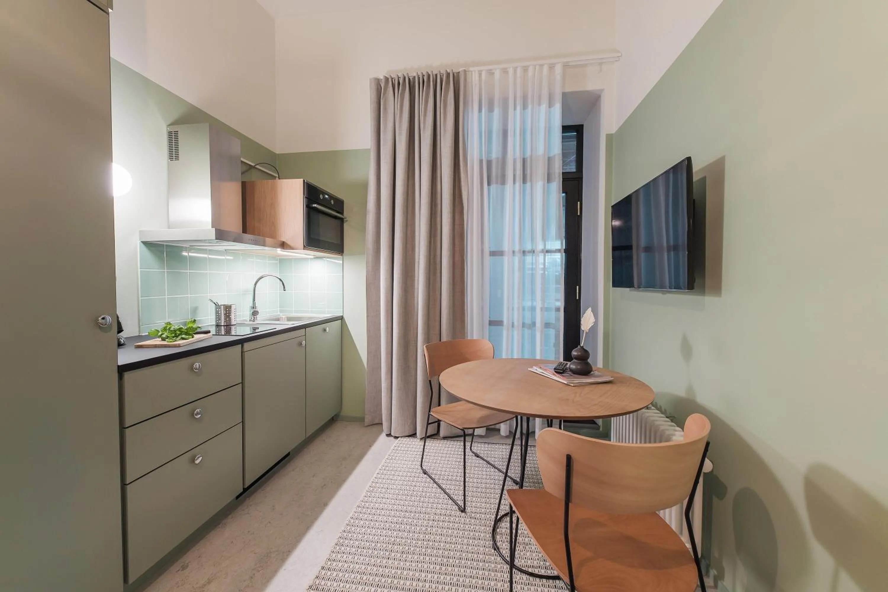 Kitchen or kitchenette in Forenom Aparthotel Jyväskylä