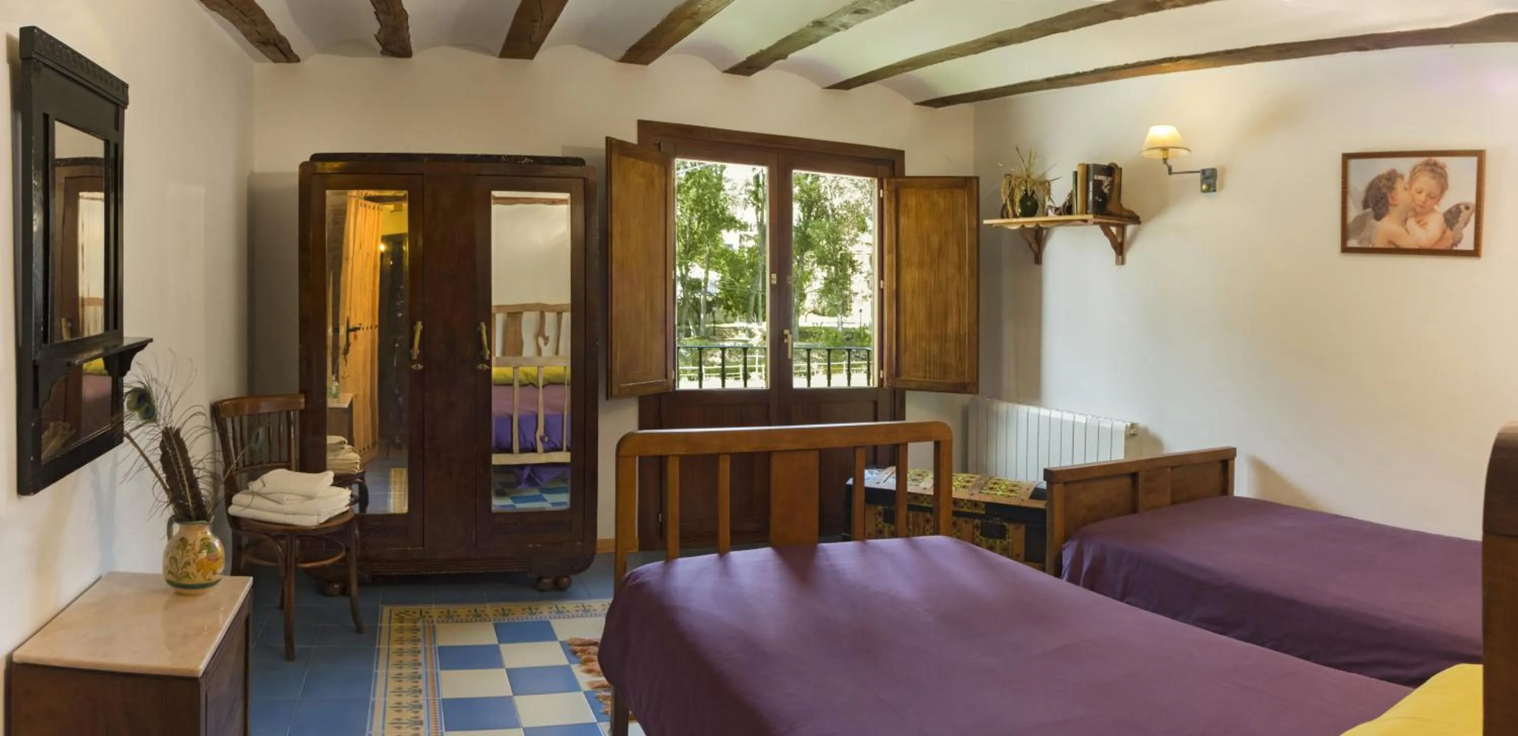 Decorative detail, Bed in Hotel Rural Villa Liquidámbar