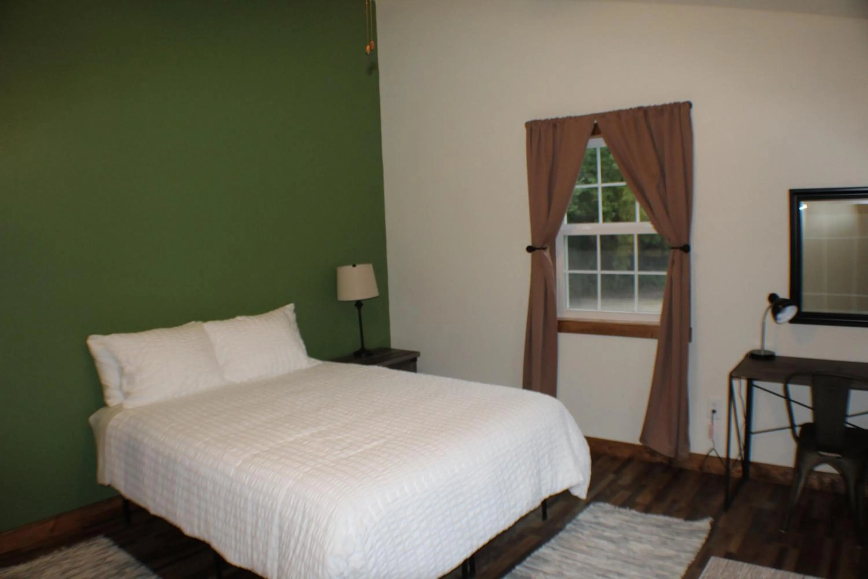 Bed in Trailhead Suites