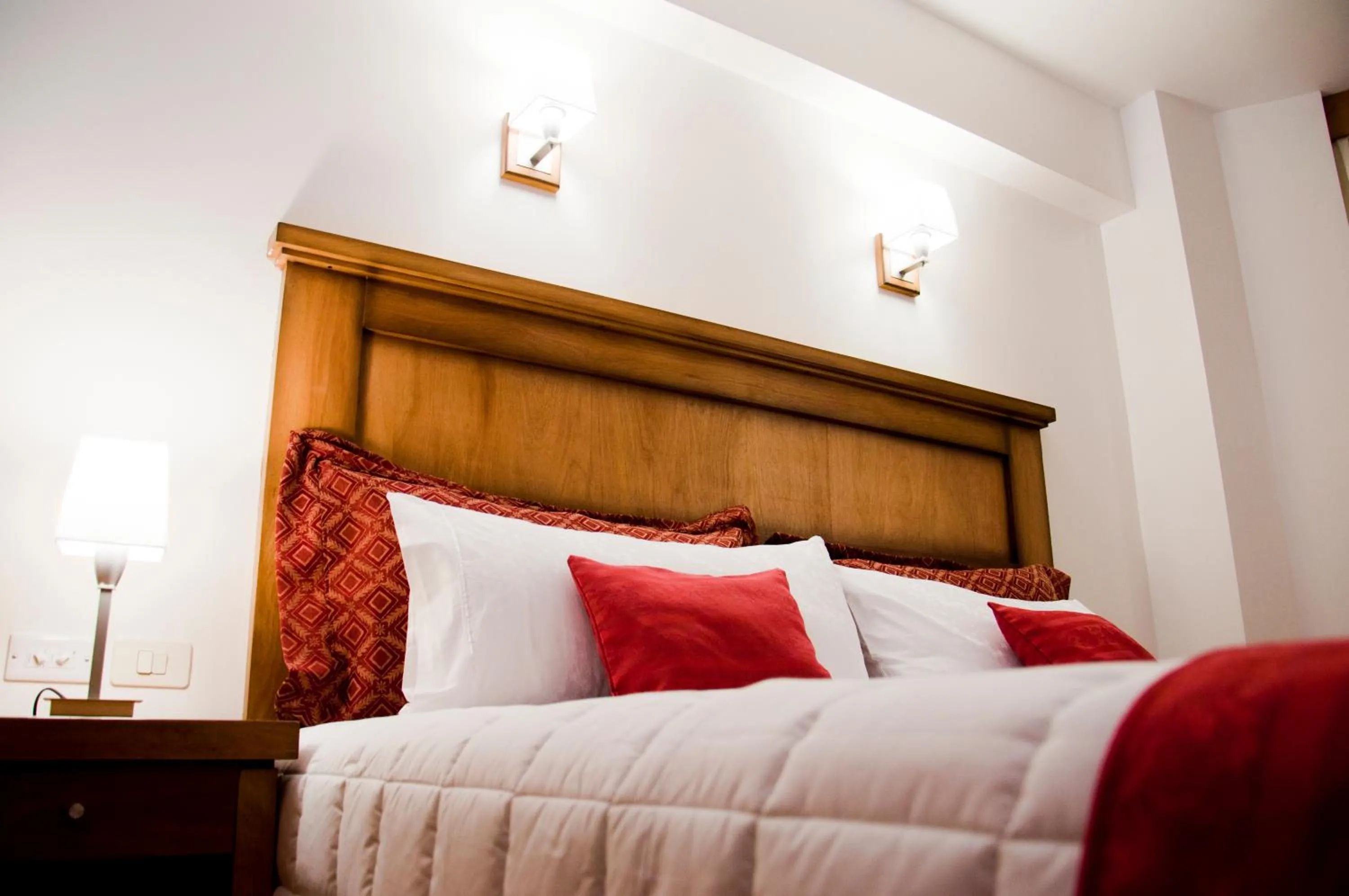 Bed in De la Trinidad Hotel