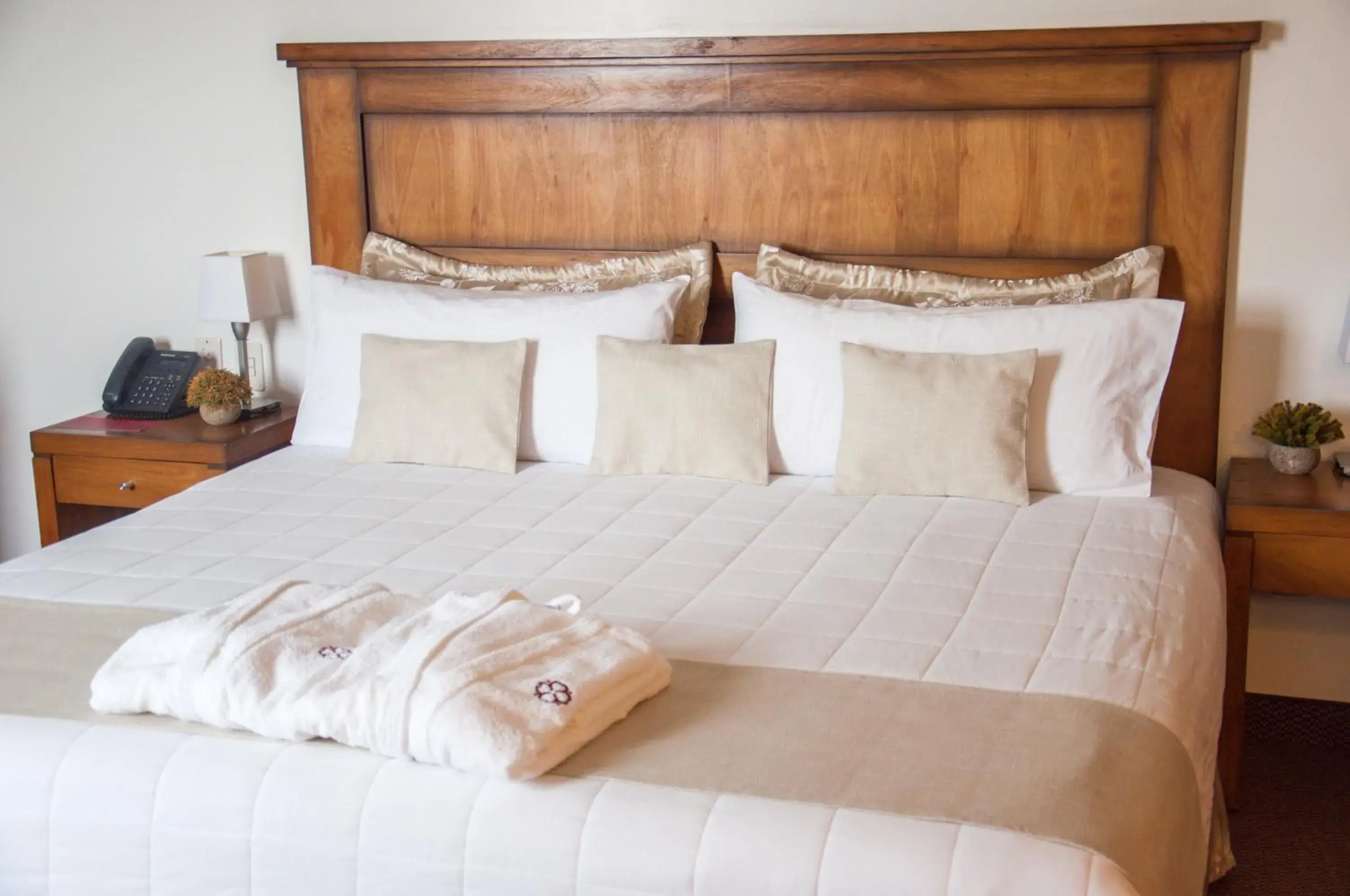 Bed in De la Trinidad Hotel