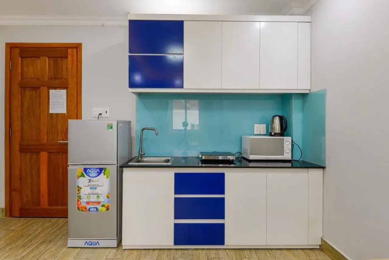 stove in Warm Ways 3 Hotel & Serviced Apartments stove in Warm Ways 3 Hotel & Serviced Apartments