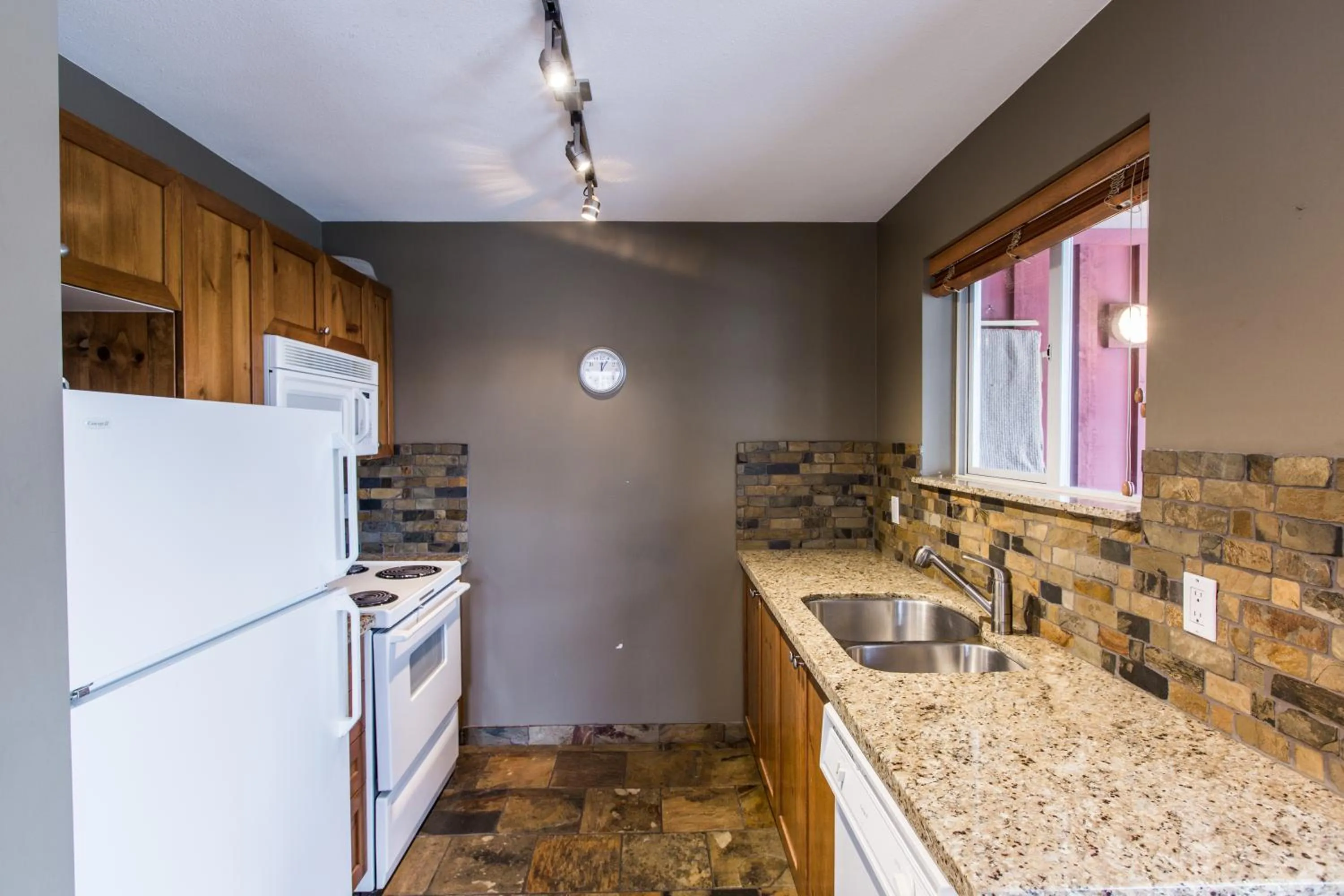 Kitchen or kitchenette in Whistler Blackcomb Vacation Rentals - Village North