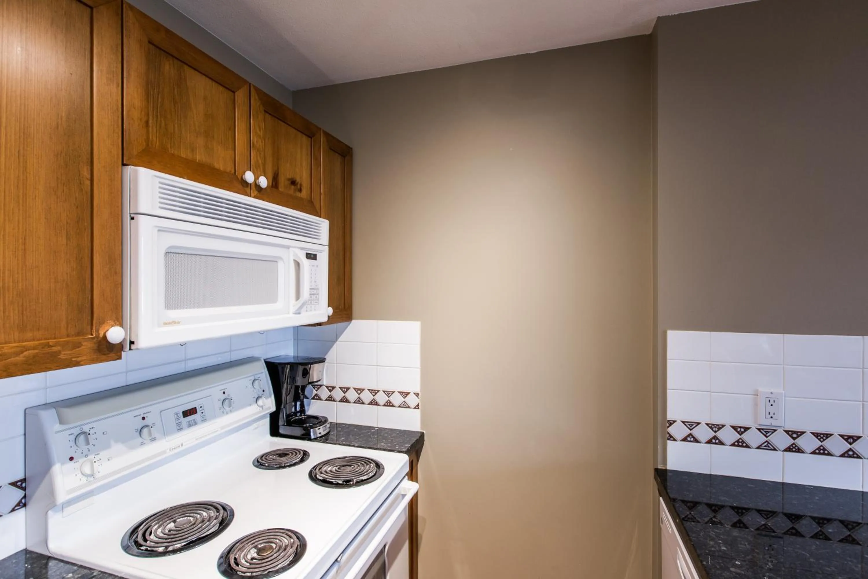 Kitchen or kitchenette in Whistler Blackcomb Vacation Rentals - Village North
