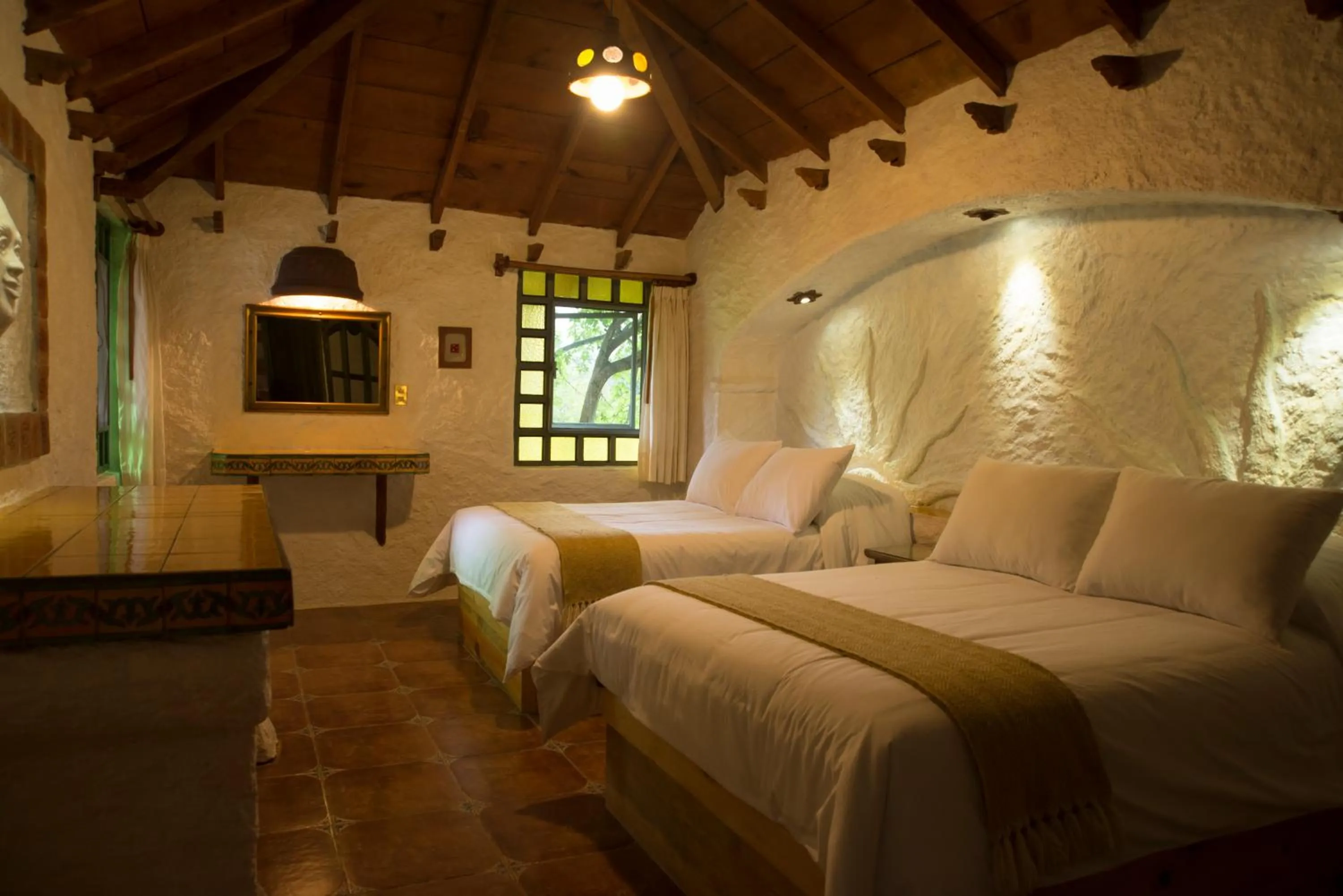 Bed in Hotel Bosques del Sol Suites