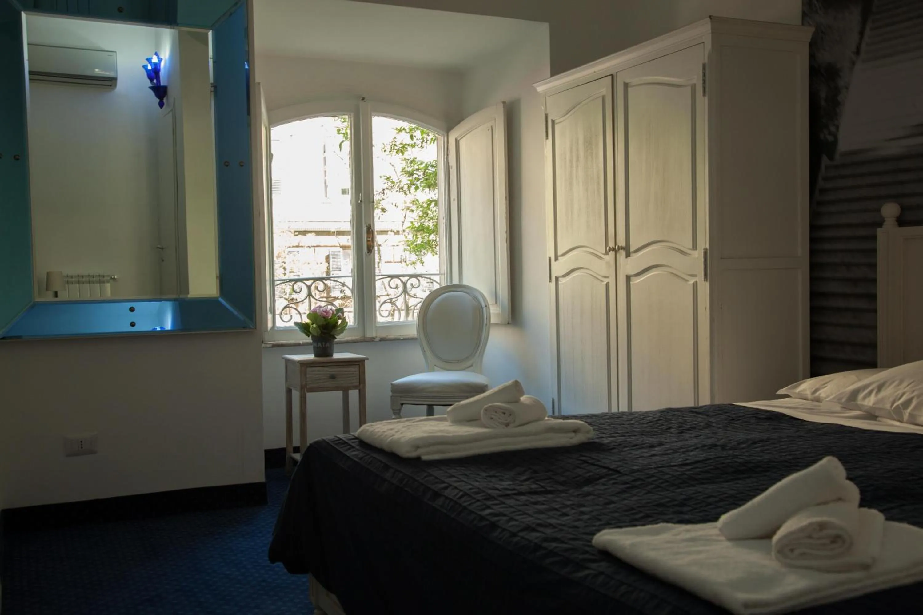 Photo of the whole room, Bed in White Vatican