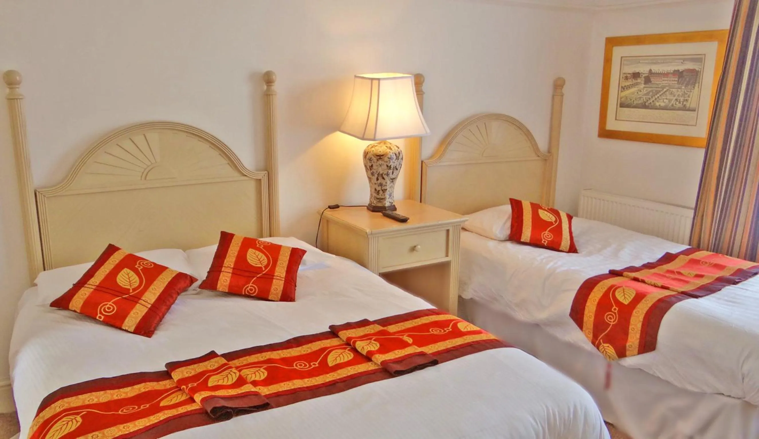 Bed in Jessamine House Hotel