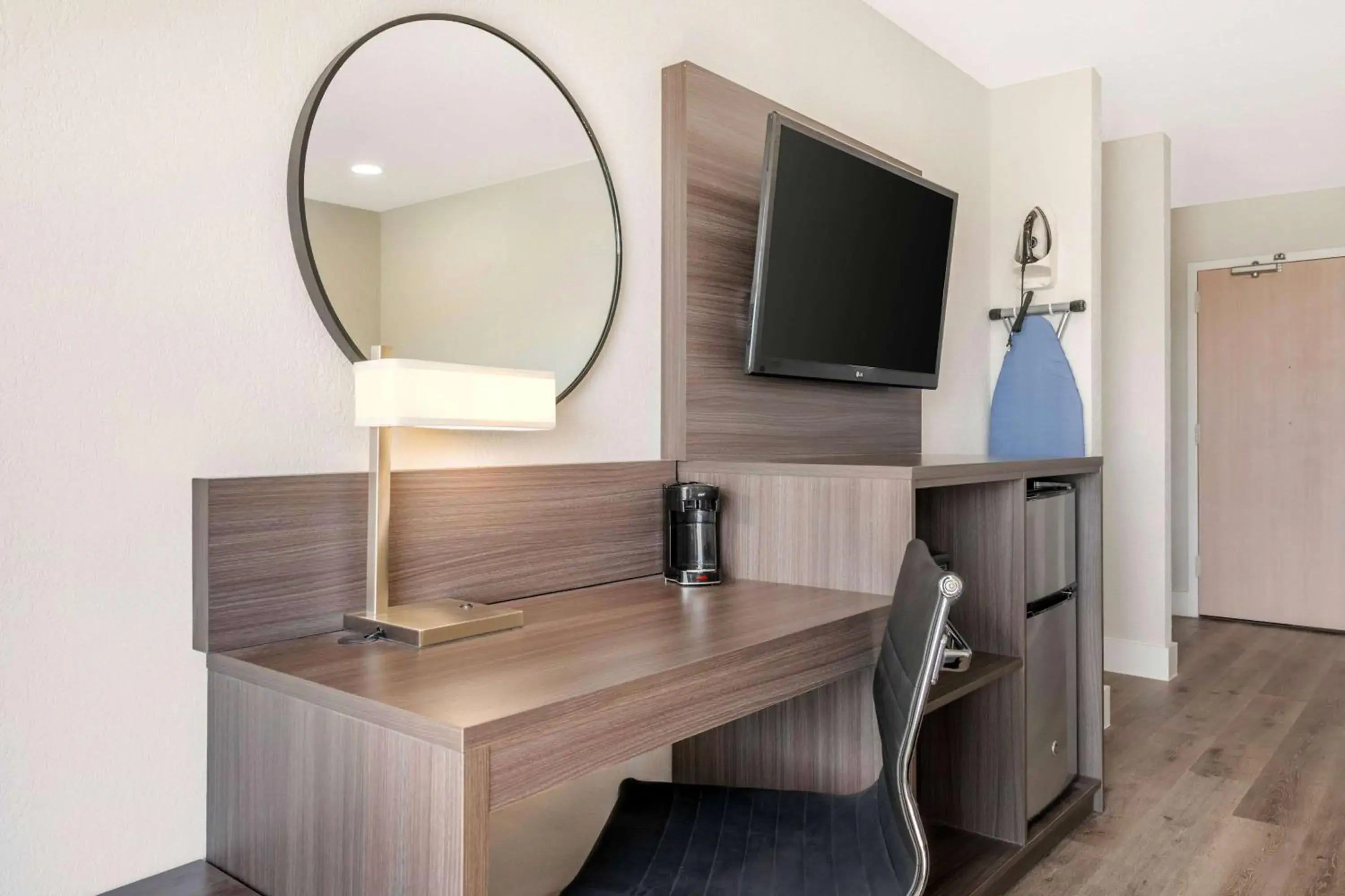 Photo of the whole room in Super 8 by Wyndham Orlando Near Florida Mall Photo of the whole room in Super 8 by Wyndham Orlando Near Florida Mall