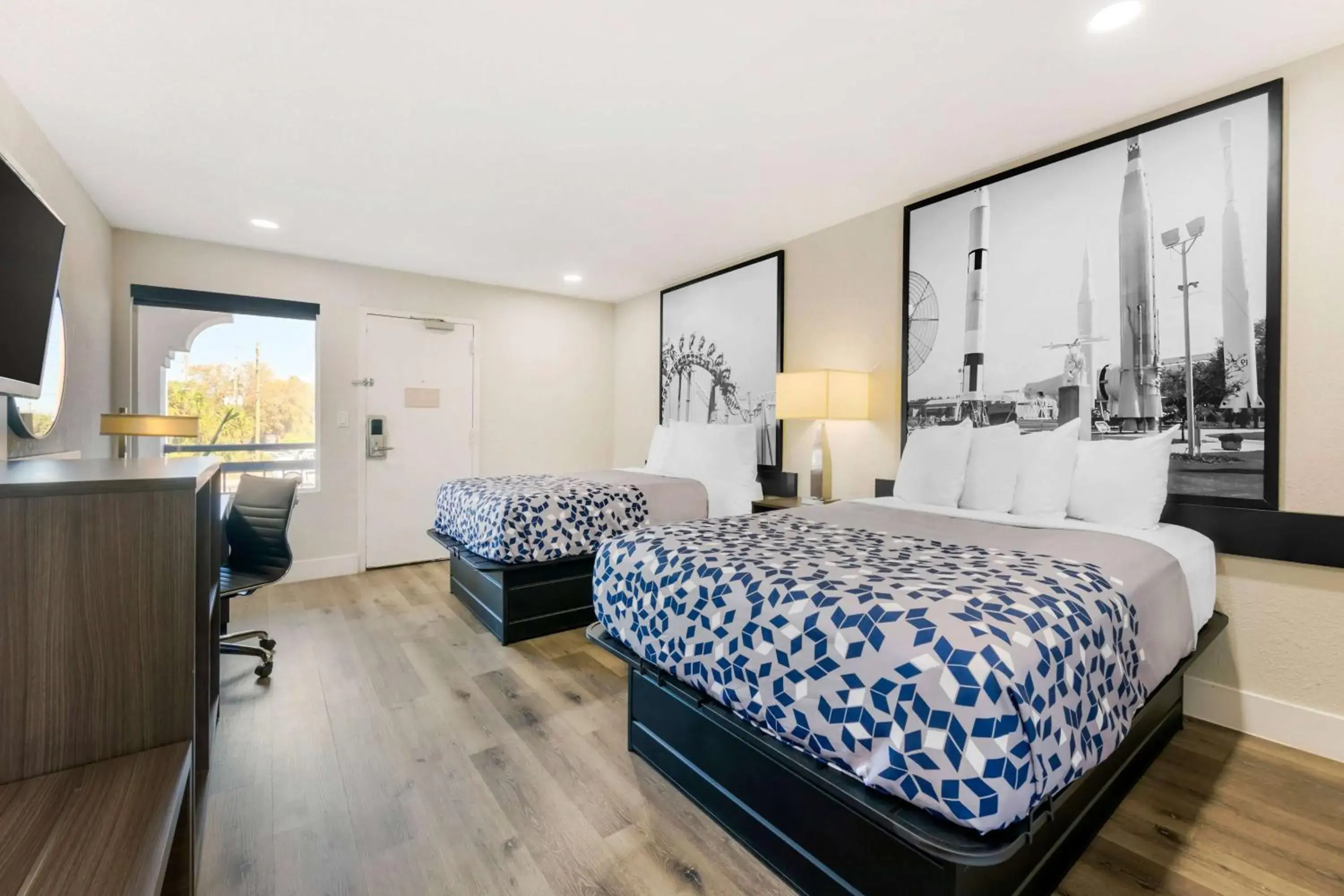 Photo of the whole room, Bed in Super 8 by Wyndham Orlando Near Florida Mall Photo of the whole room, Bed in Super 8 by Wyndham Orlando Near Florida Mall