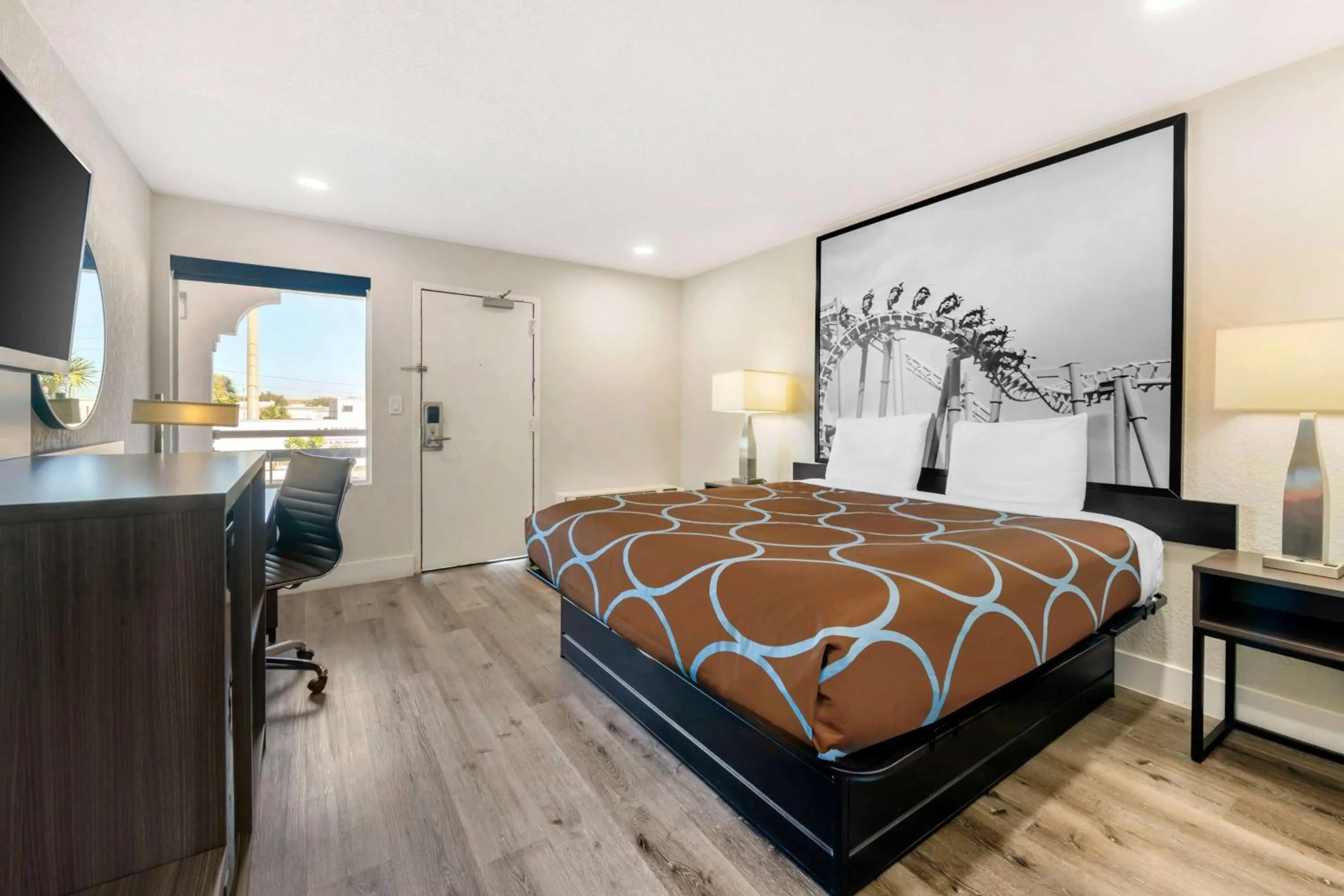 Photo of the whole room, Bed in Super 8 by Wyndham Orlando Near Florida Mall