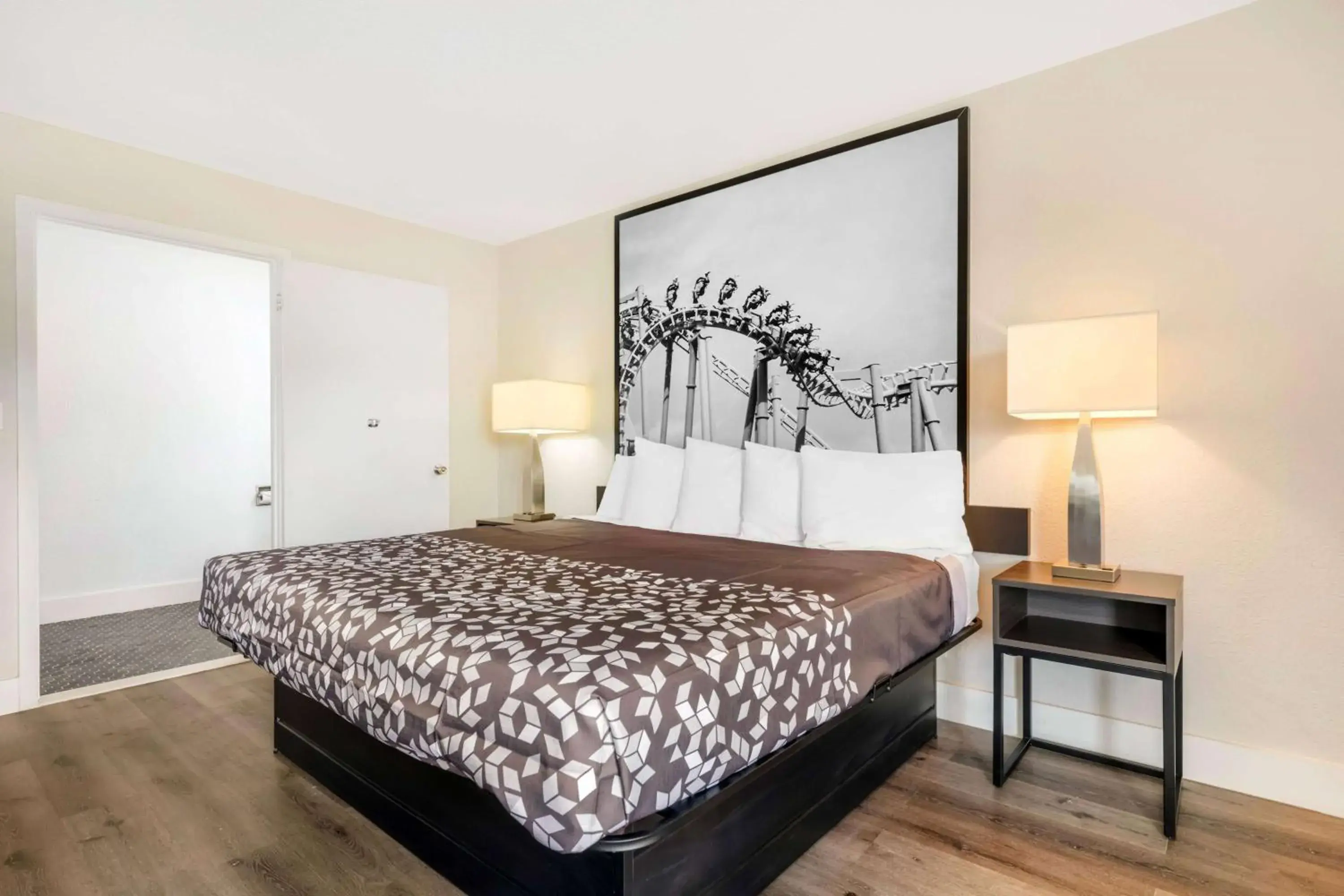 Photo of the whole room, Bed in Super 8 by Wyndham Orlando Near Florida Mall Photo of the whole room, Bed in Super 8 by Wyndham Orlando Near Florida Mall