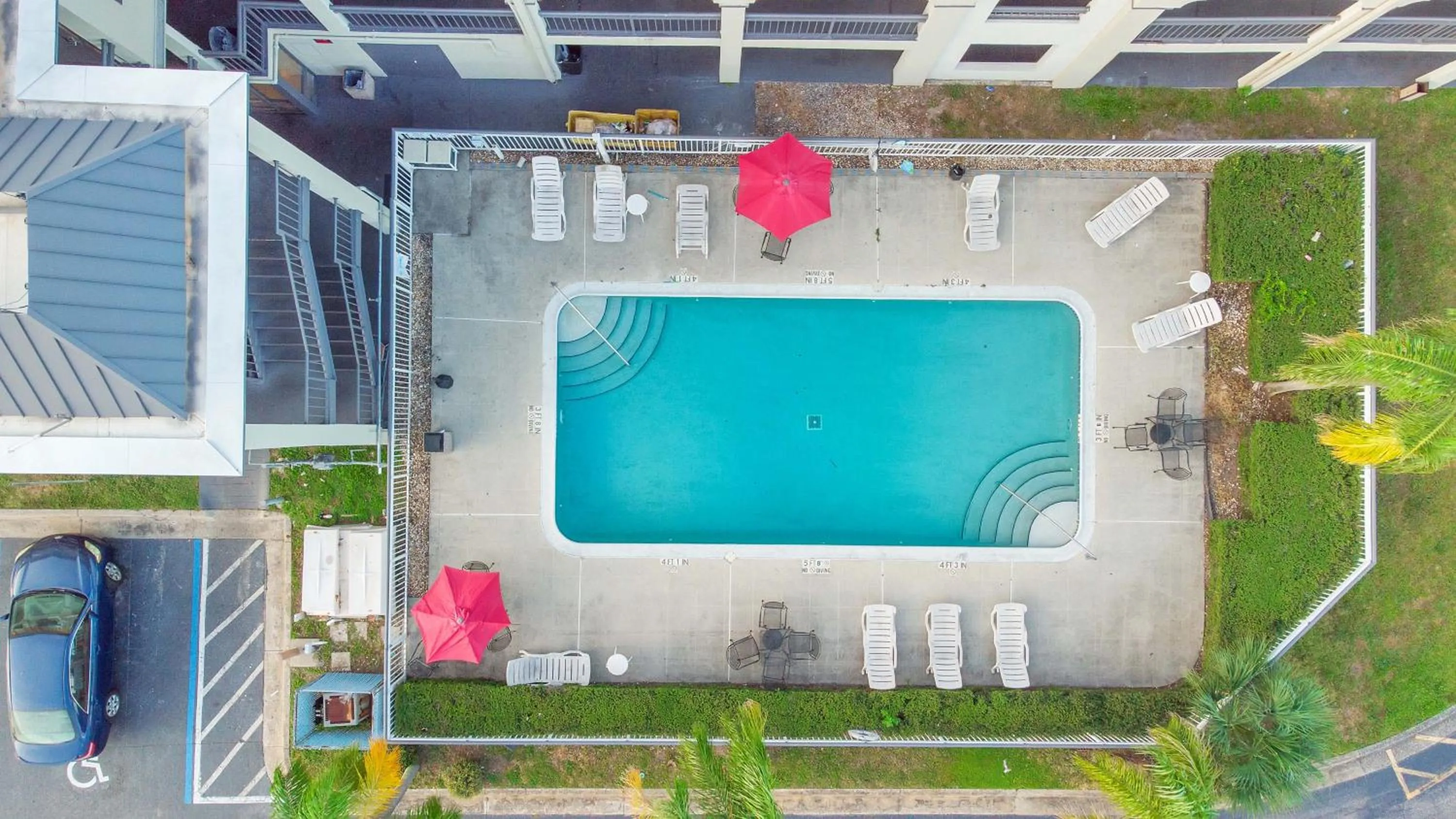 Swimming pool in Super 8 by Wyndham Orlando Near Florida Mall