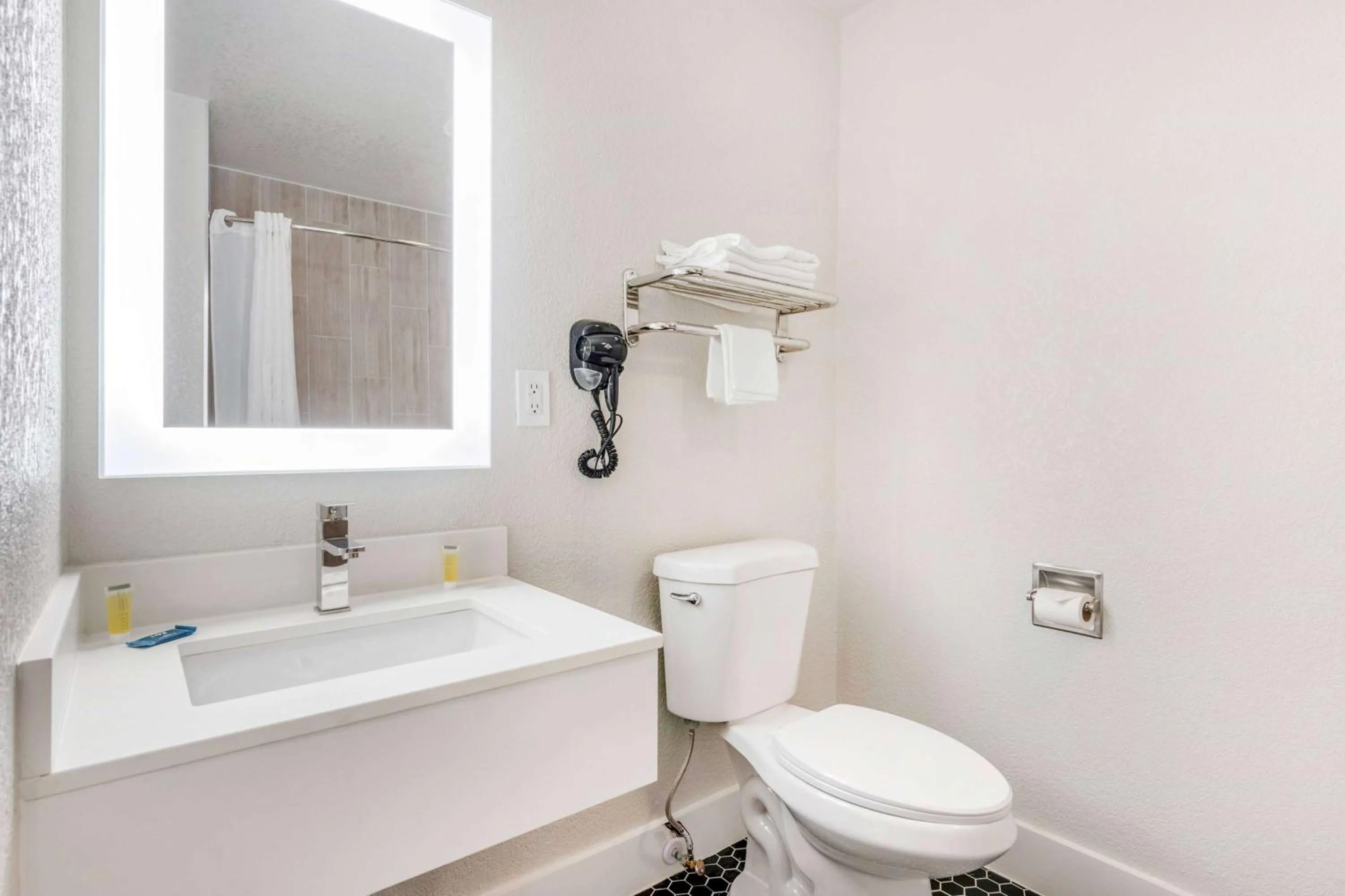 Photo of the whole room in Super 8 by Wyndham Orlando Near Florida Mall