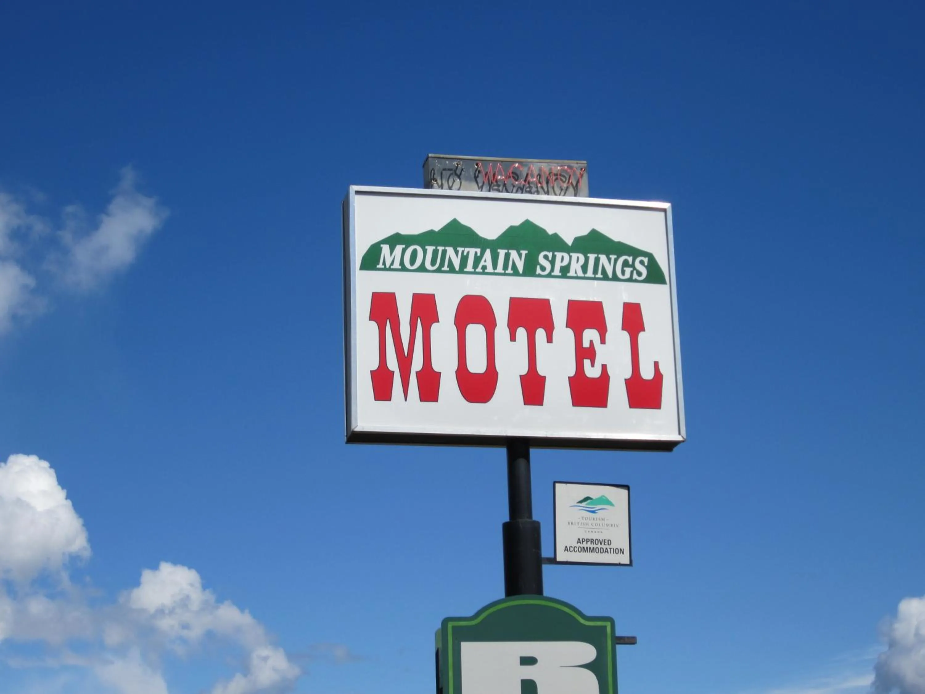 Property logo or sign in Mountain Springs Motel & RV Park