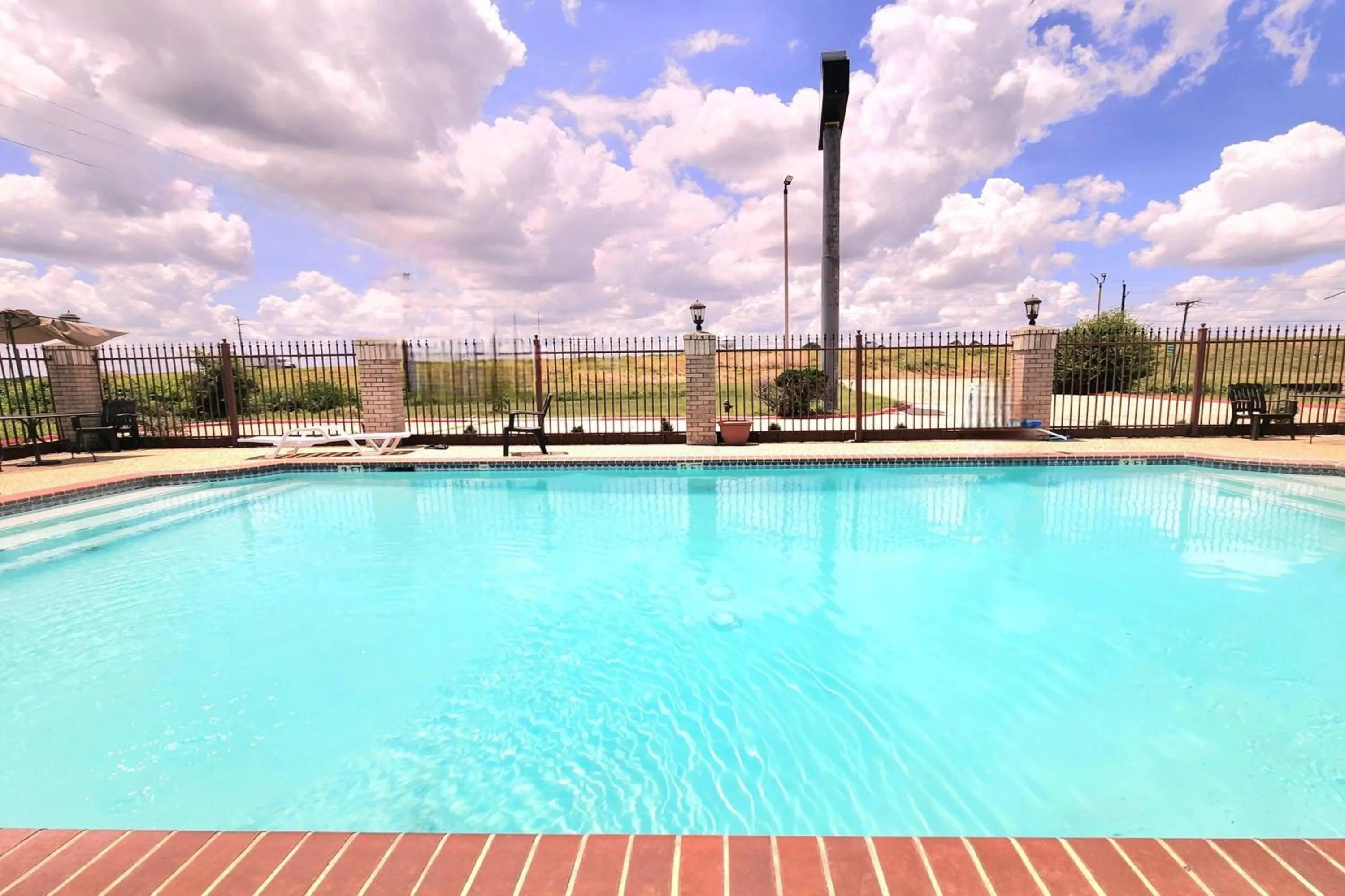 Pool view in Days Inn by Wyndham Navasota
