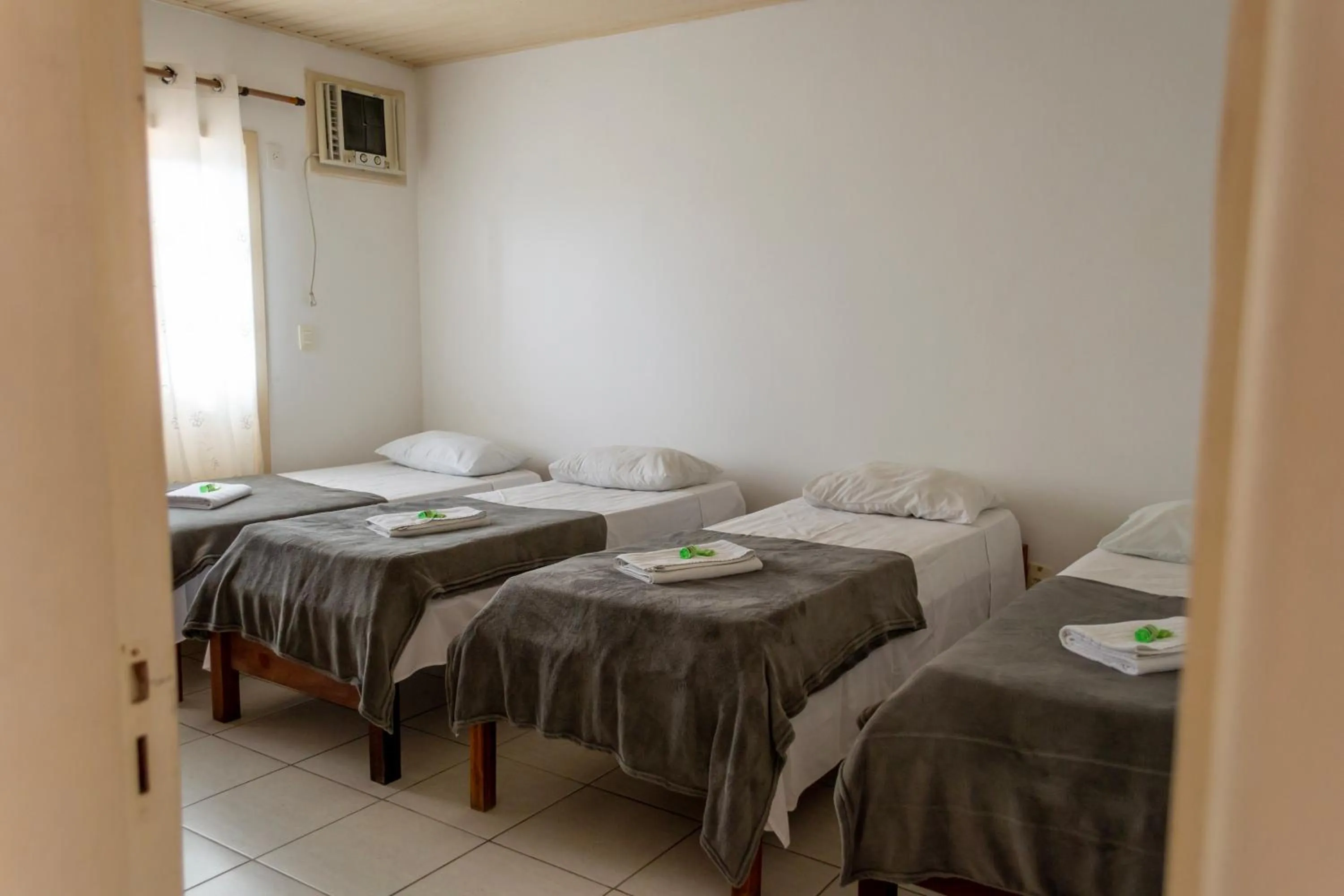 Bed in Pousada Estrada do Ouro